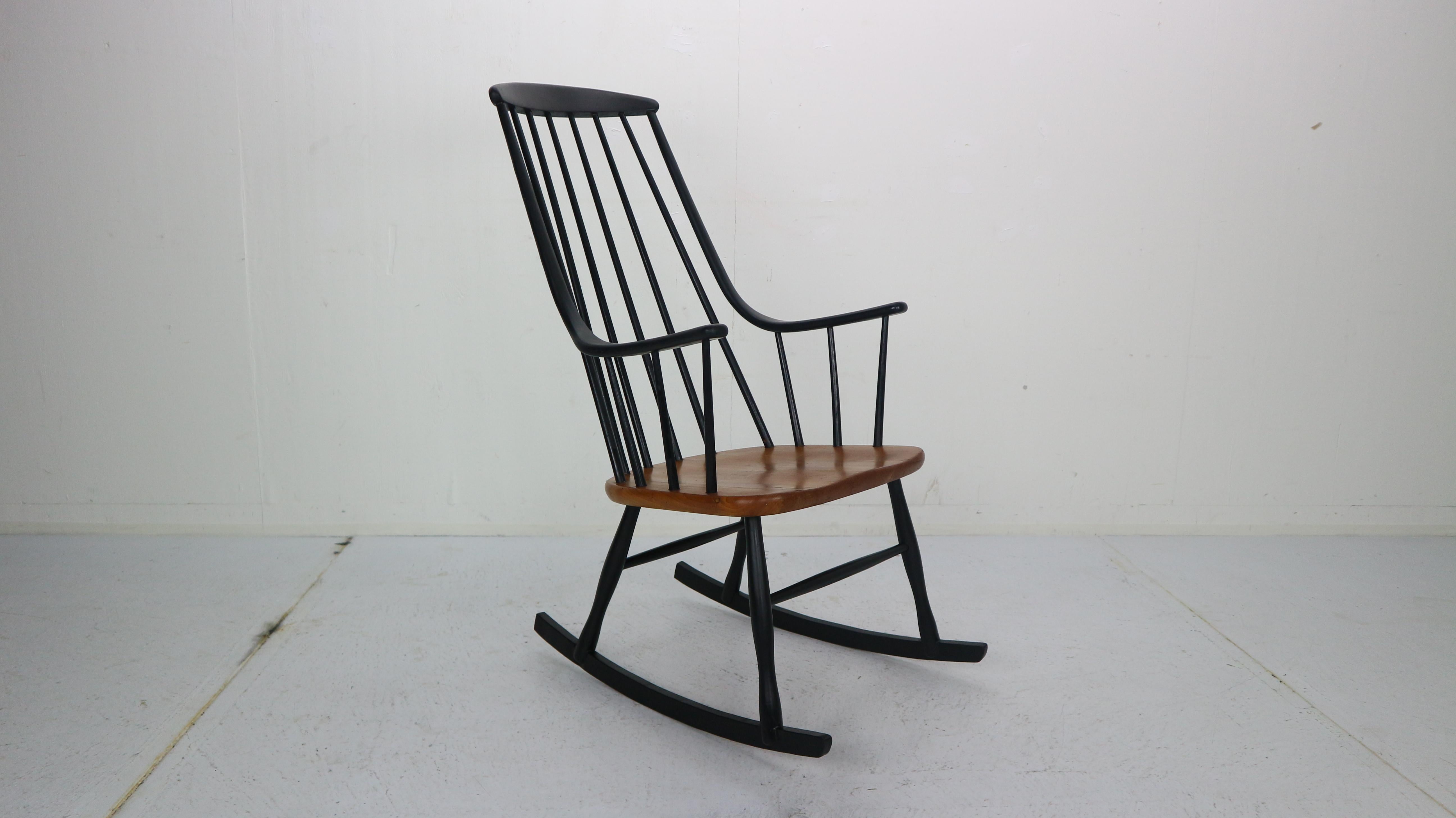 Scandinavian modern design rocking chair designed by Lena Larsoon and manufactured by Nesto in 1960s period, Sweden.
Model name: Grandessa, made of- teak wood.
  