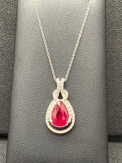 0.51 Carat Pear Shape Ruby and Diamond Drop Pendant in 18K White Gold