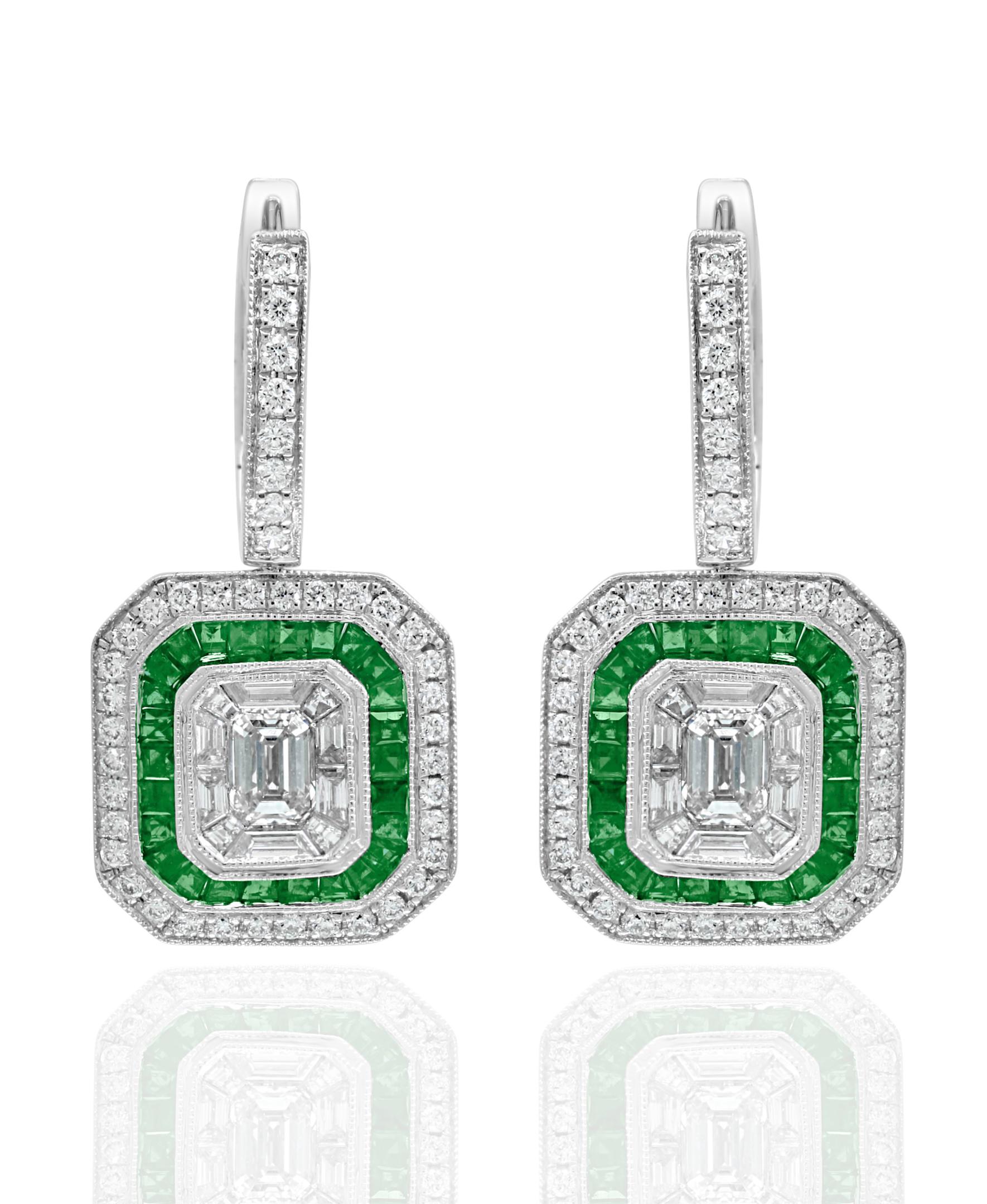 Classic 18k white gold dangle earrings set with 2 emerald cut Diamonds weighing 0.62 carats total. The diamonds are surrounded by 1 row of brilliant 84 round diamonds weighing 0.52 carats and  other row of super rich 88 emerald cut emeralds. A