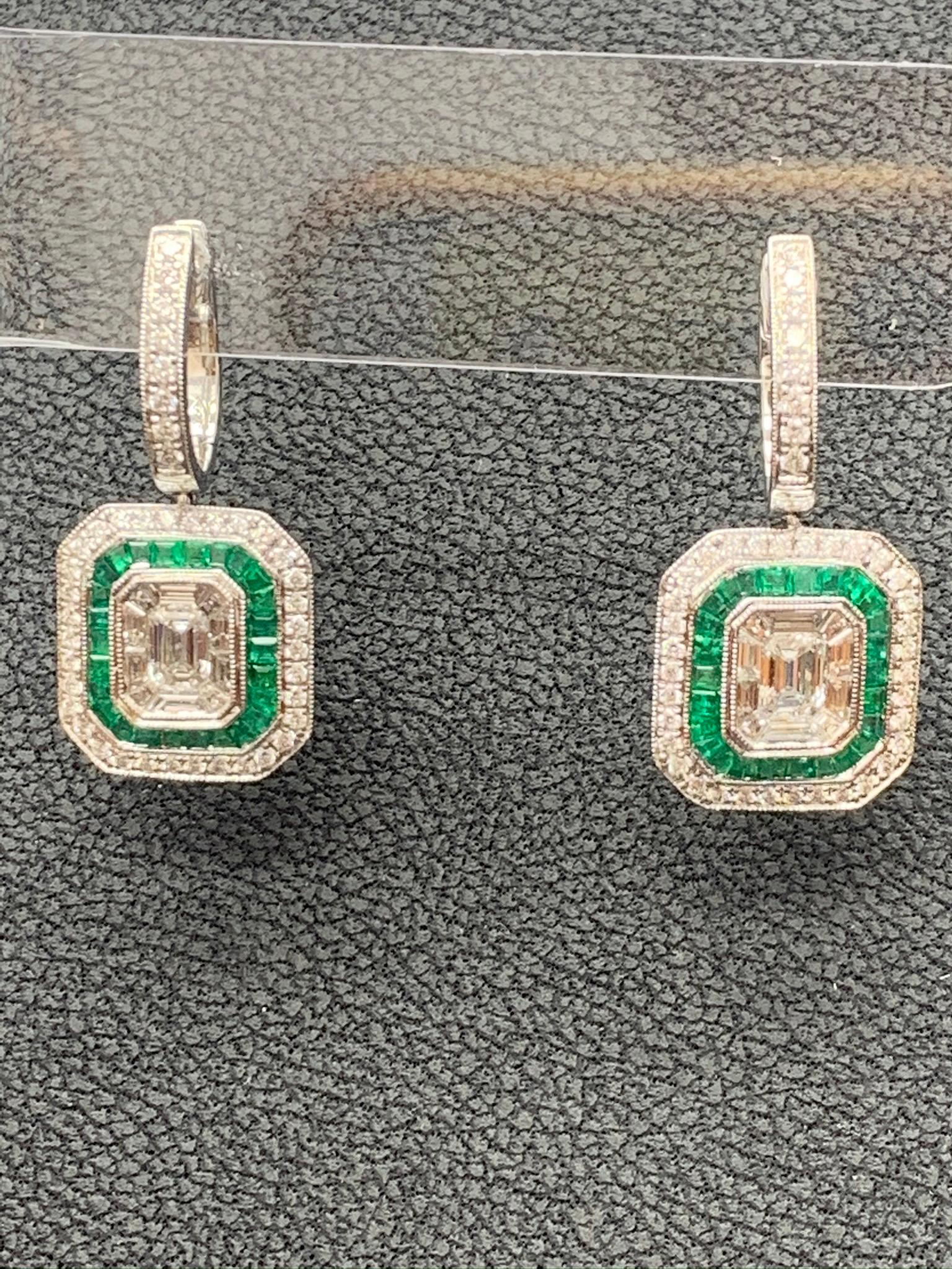 0.62 Carat Emerald Cut Diamond Emerald 18K White Gold Dangle Earrings In New Condition For Sale In NEW YORK, NY