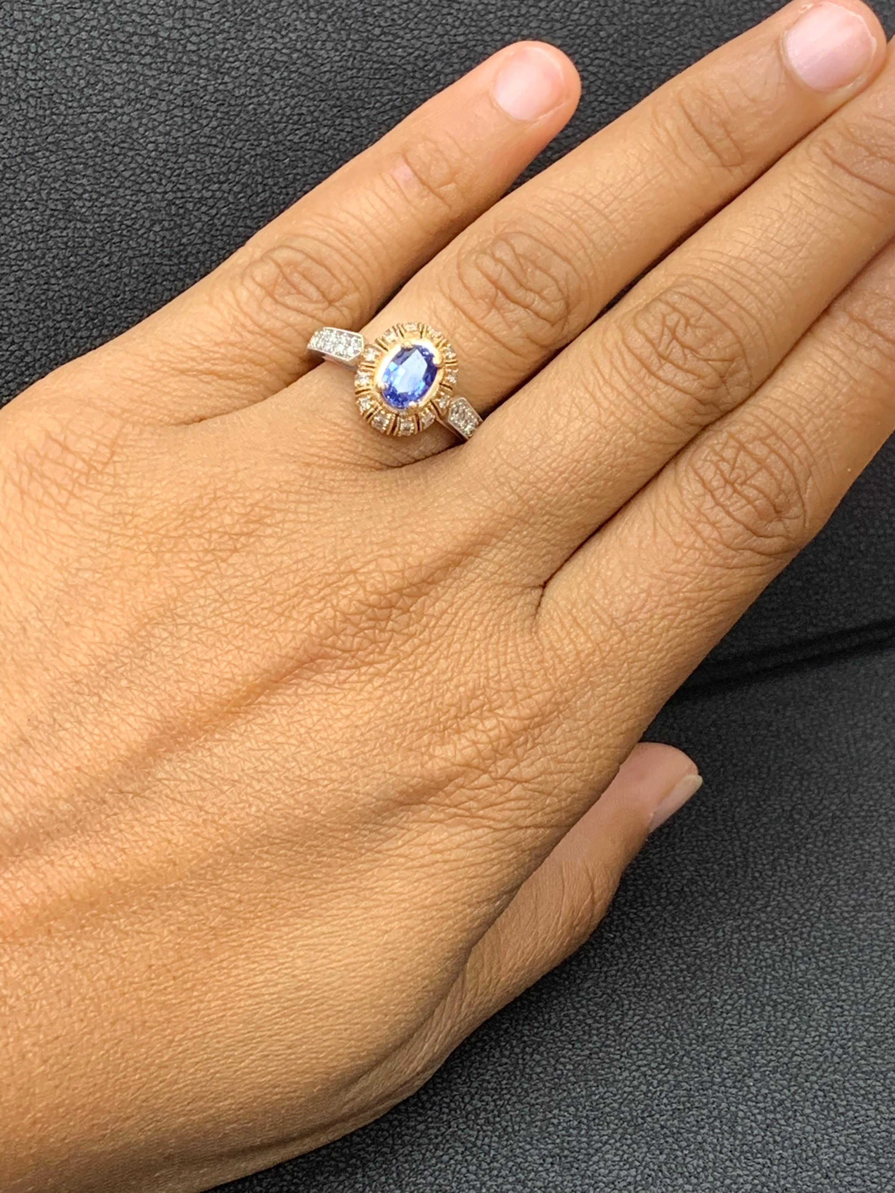 A vibrant 0.80 carat oval cut blue sapphire takes center stage as it elegantly contrasts the rose gold around it . Accent diamonds weigh 0.54 carats total. Made in 18 karat mix gold.

Size 6.5 US (Sizable). One of a Kind  piece.
All diamonds are GH