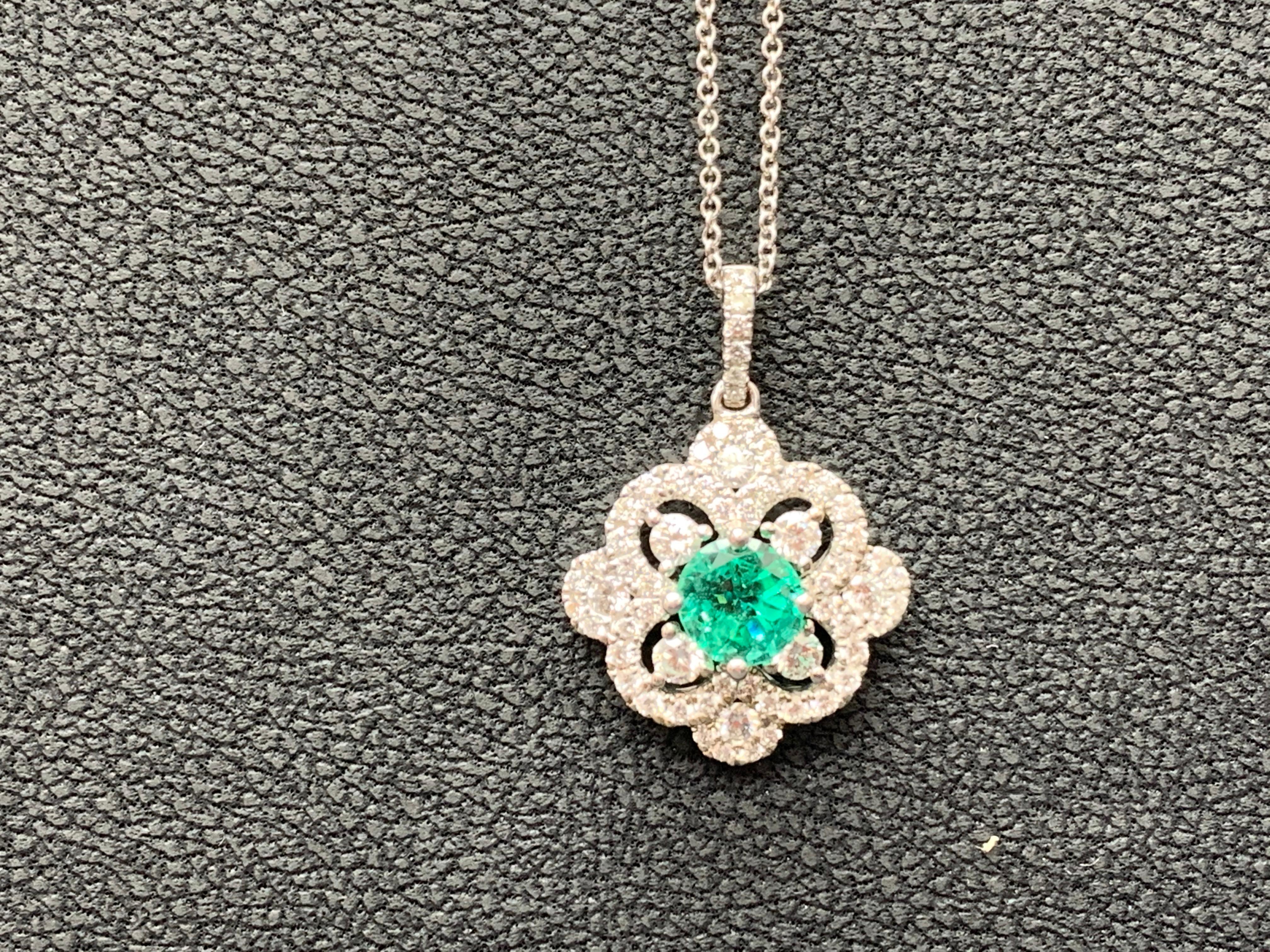 Women's 0.81 Carat Round Cut Emerald and Diamond Pendant Necklace in 18K For Sale