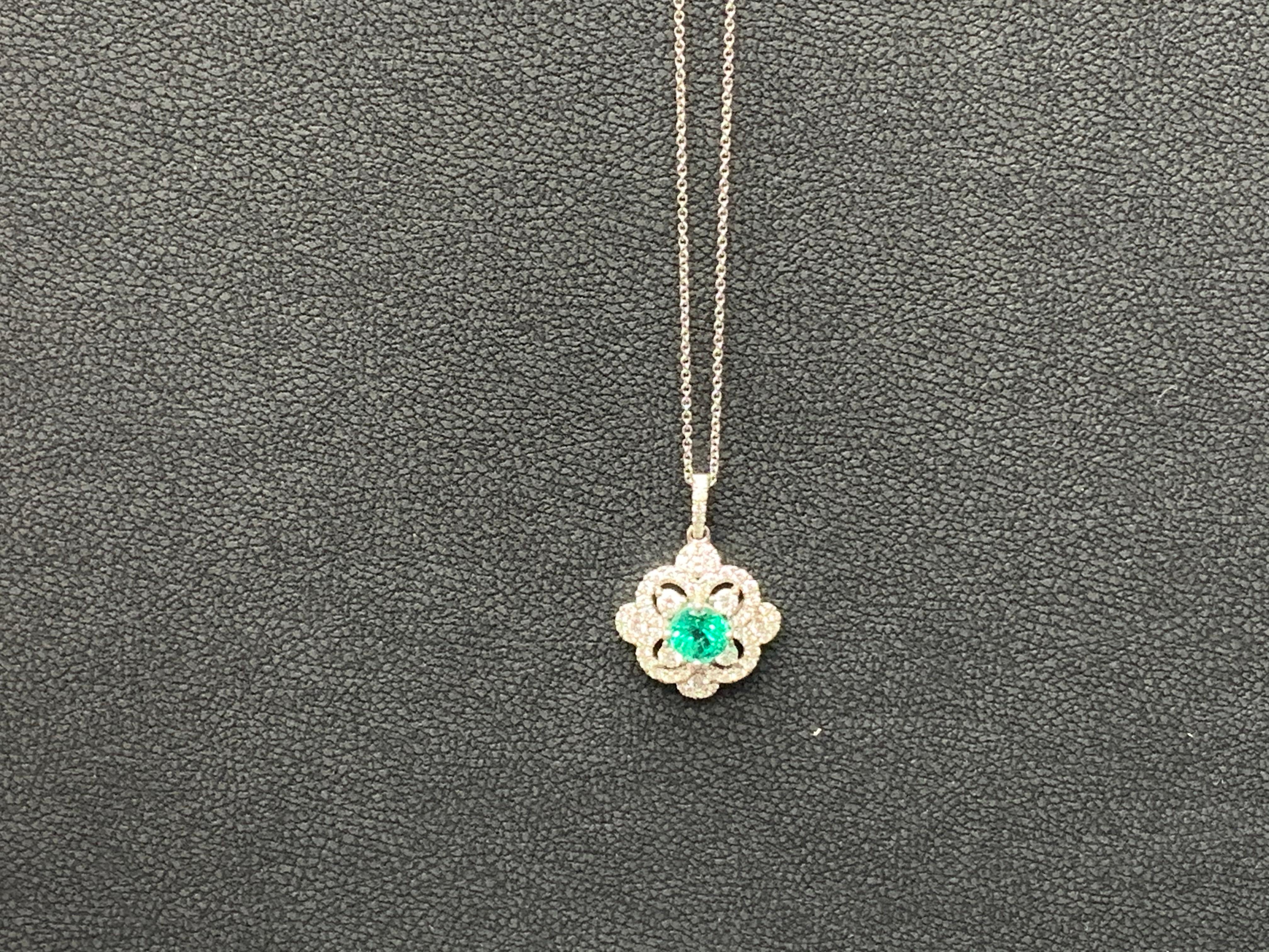 0.81 Carat Round Cut Emerald and Diamond Pendant Necklace in 18K For Sale 1