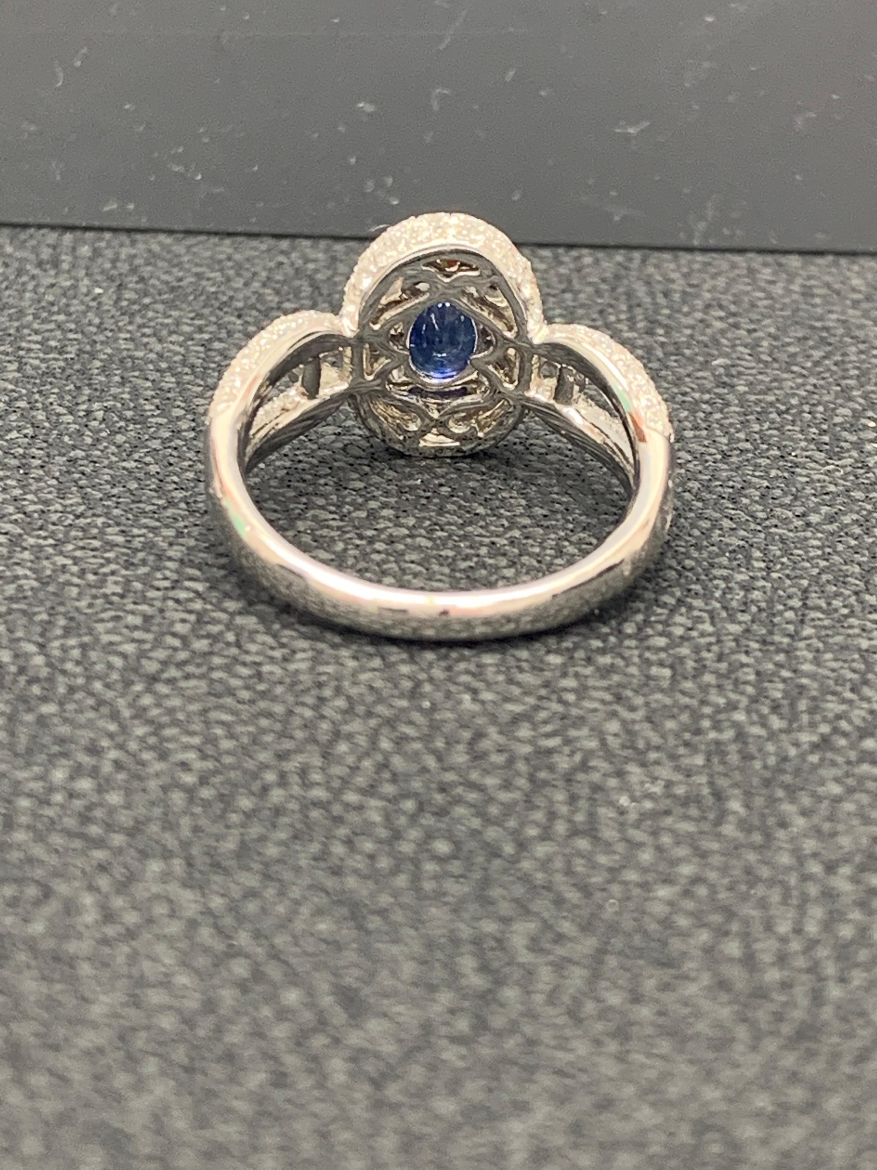 Grandeur 0.94 Carat Oval Blue Sapphire Diamond 18K White Gold Engagement Ring For Sale 4