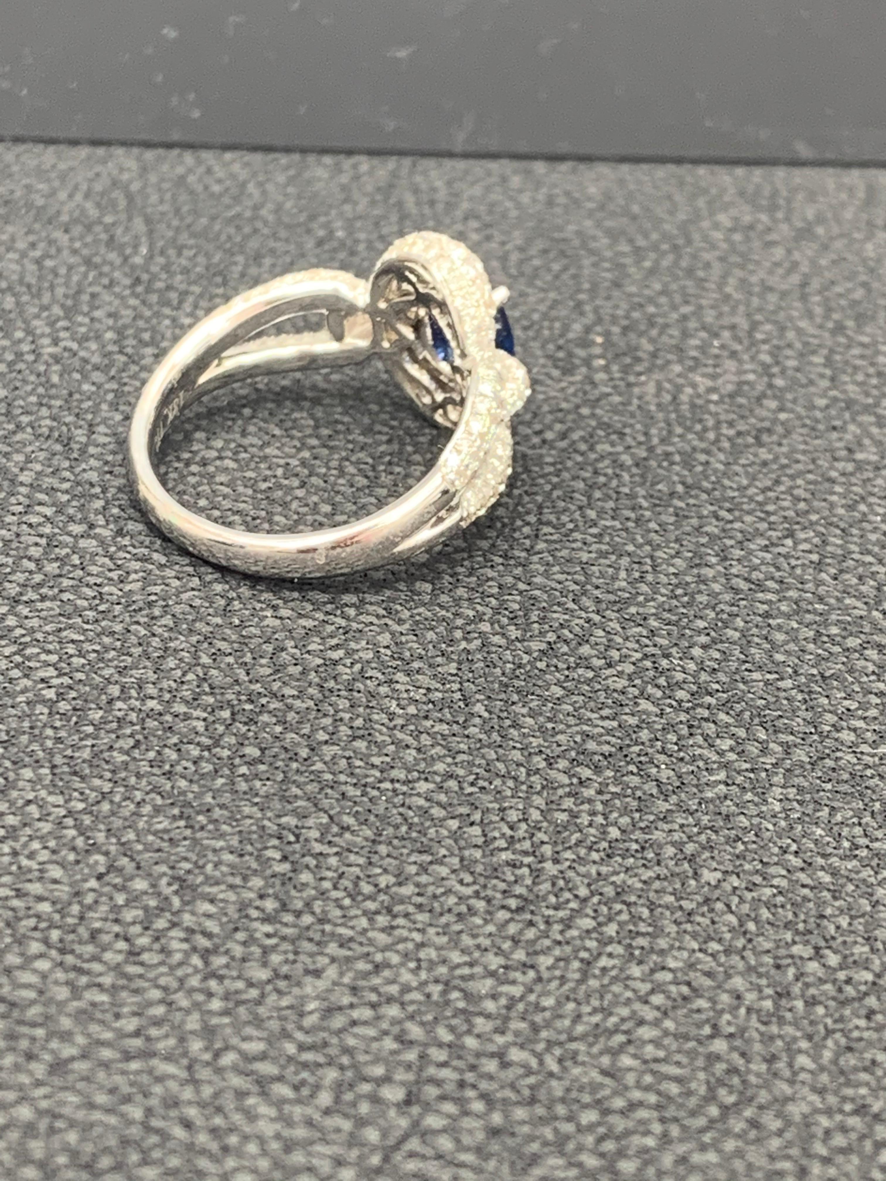 Grandeur 0.94 Carat Oval Blue Sapphire Diamond 18K White Gold Engagement Ring For Sale 5