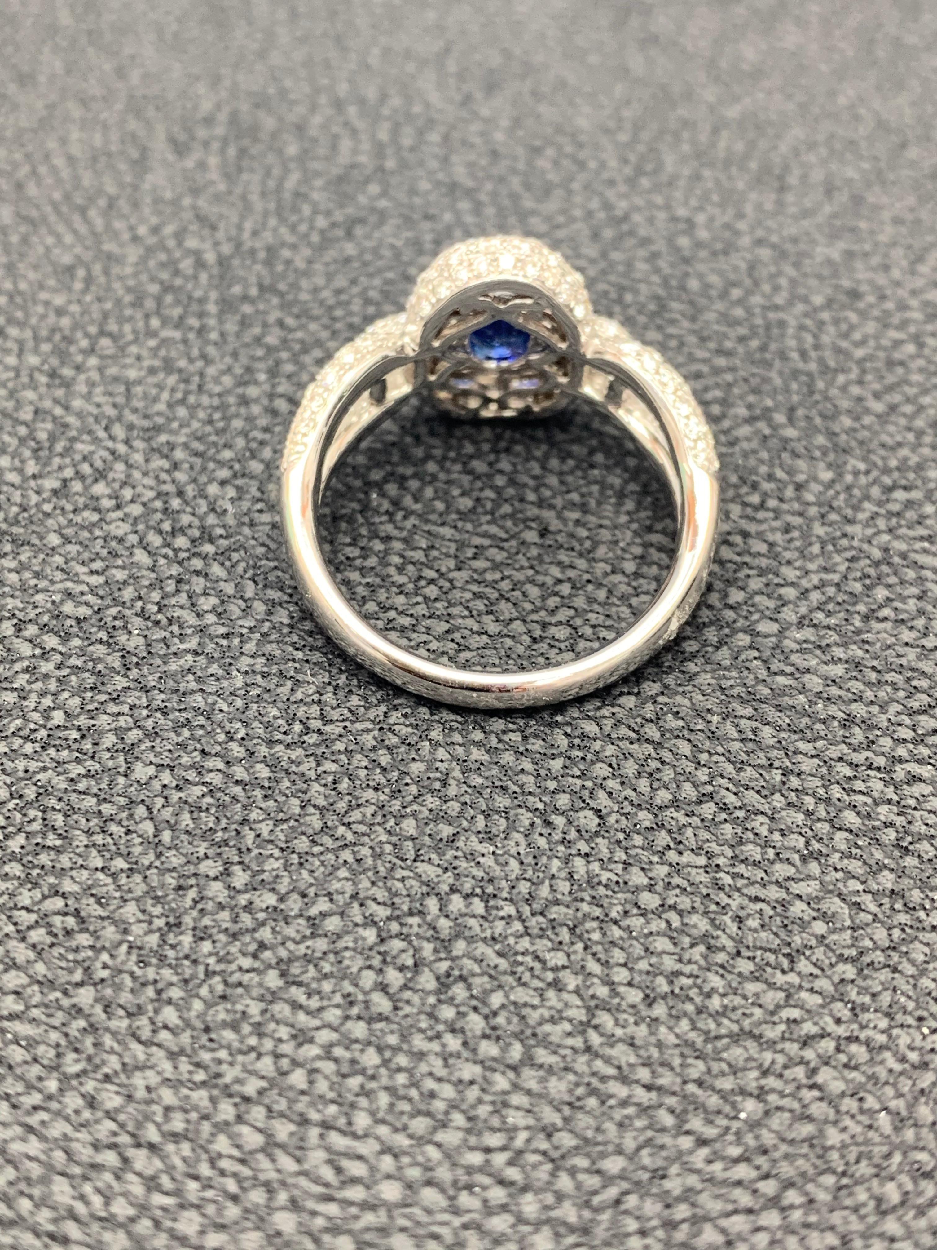 Grandeur 0.94 Carat Oval Blue Sapphire Diamond 18K White Gold Engagement Ring For Sale 6