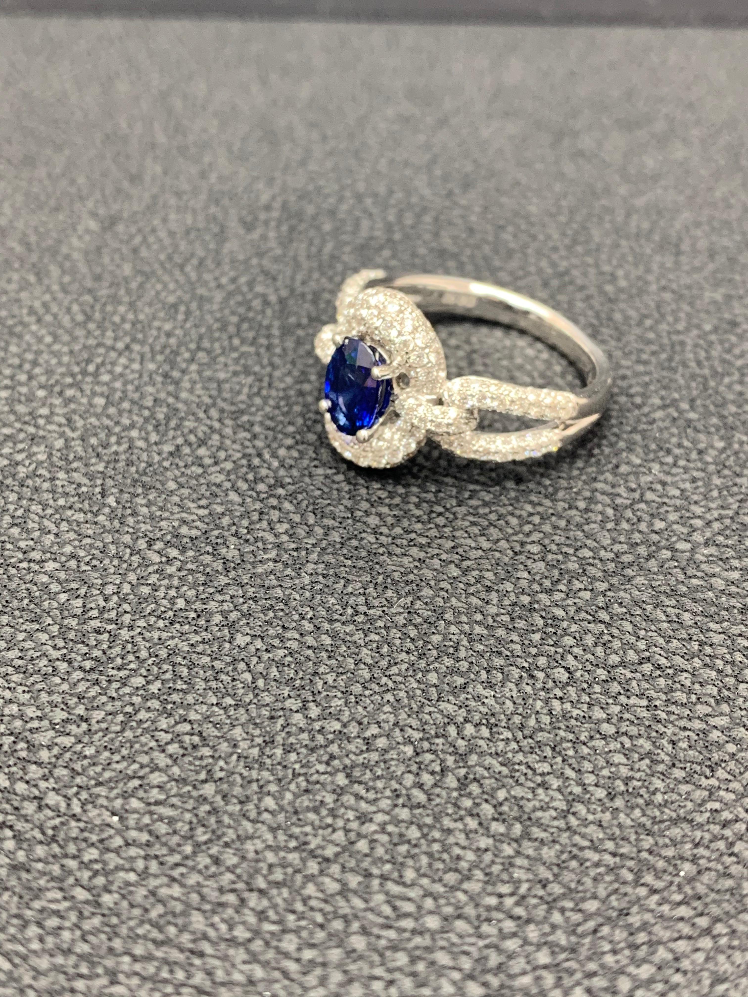 Grandeur 0.94 Carat Oval Blue Sapphire Diamond 18K White Gold Engagement Ring For Sale 7