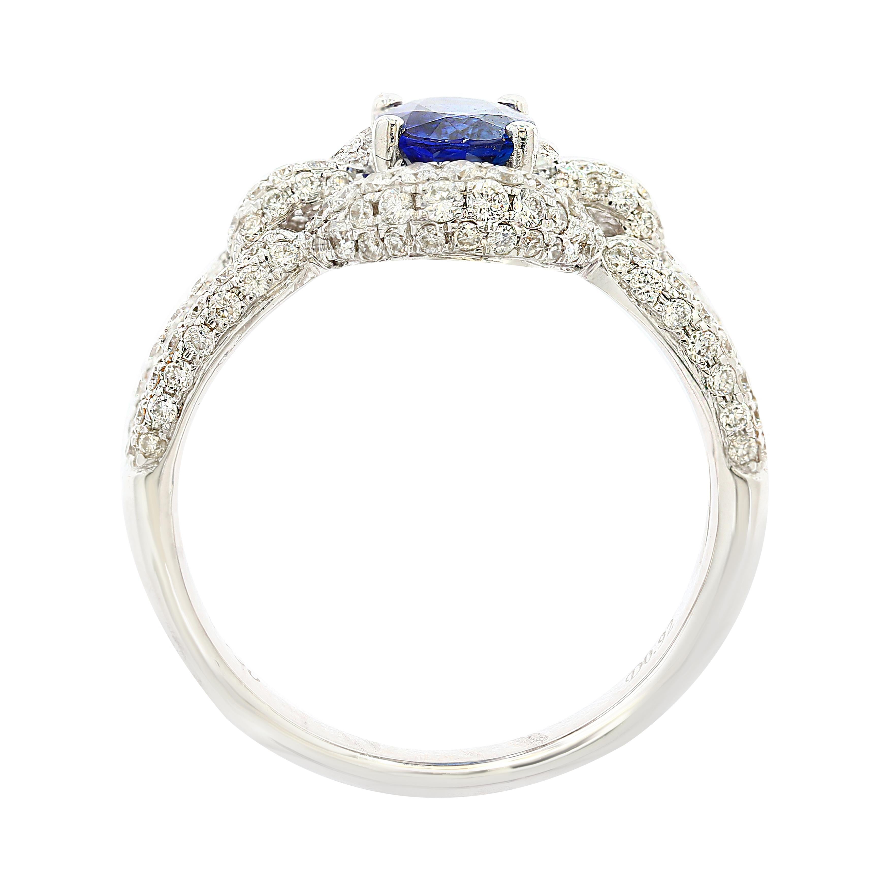 Modern Grandeur 0.94 Carat Oval Blue Sapphire Diamond 18K White Gold Engagement Ring For Sale