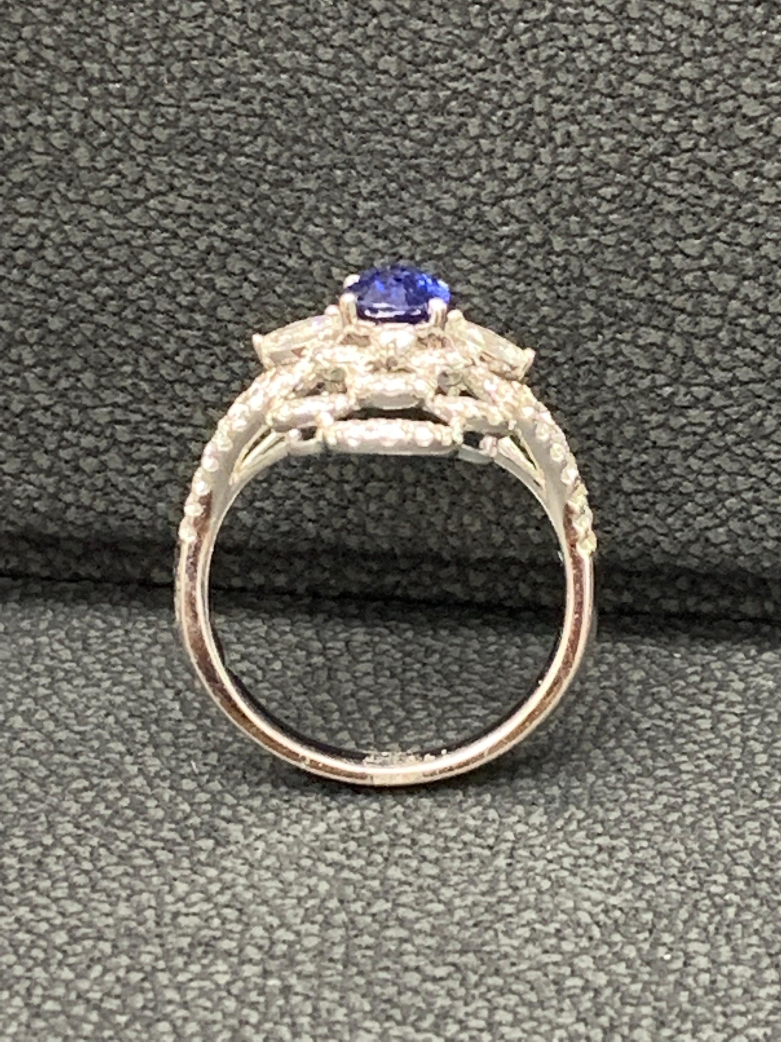 Contemporary Grandeur 0.97 Carat Oval Sapphire and Diamond Engagement Ring in 18K White Gold For Sale