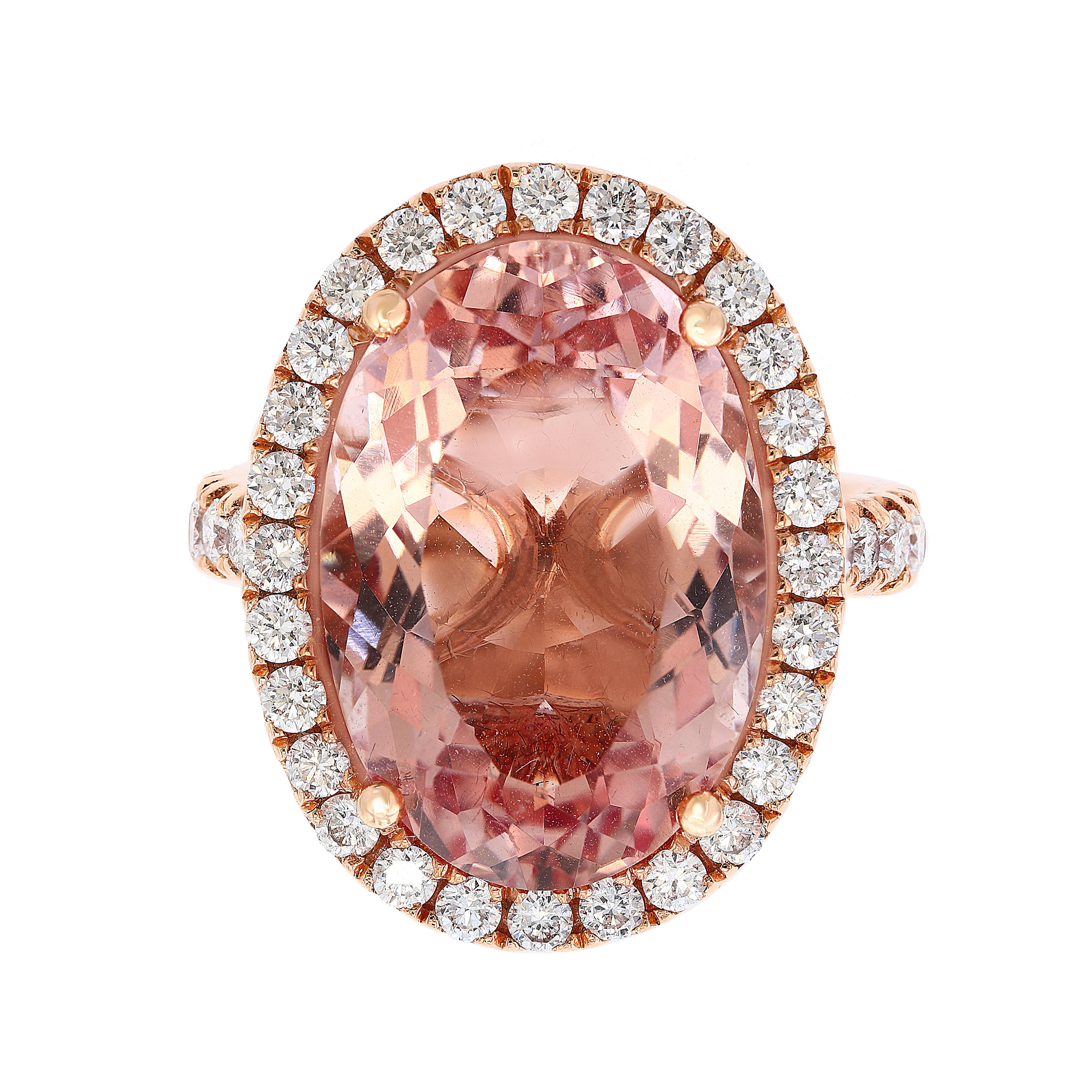 10.70 Carat Oval Shape Morganite and Diamond Cocktail Ring in 18K Rose Gold.
A classic Cocktail Ring of very clean no inclusion Morganite full of luster and shine.
42 Brillaint cut Round Diamonds with Total weight of 1.05. 
Ring Size 6.5 (Its