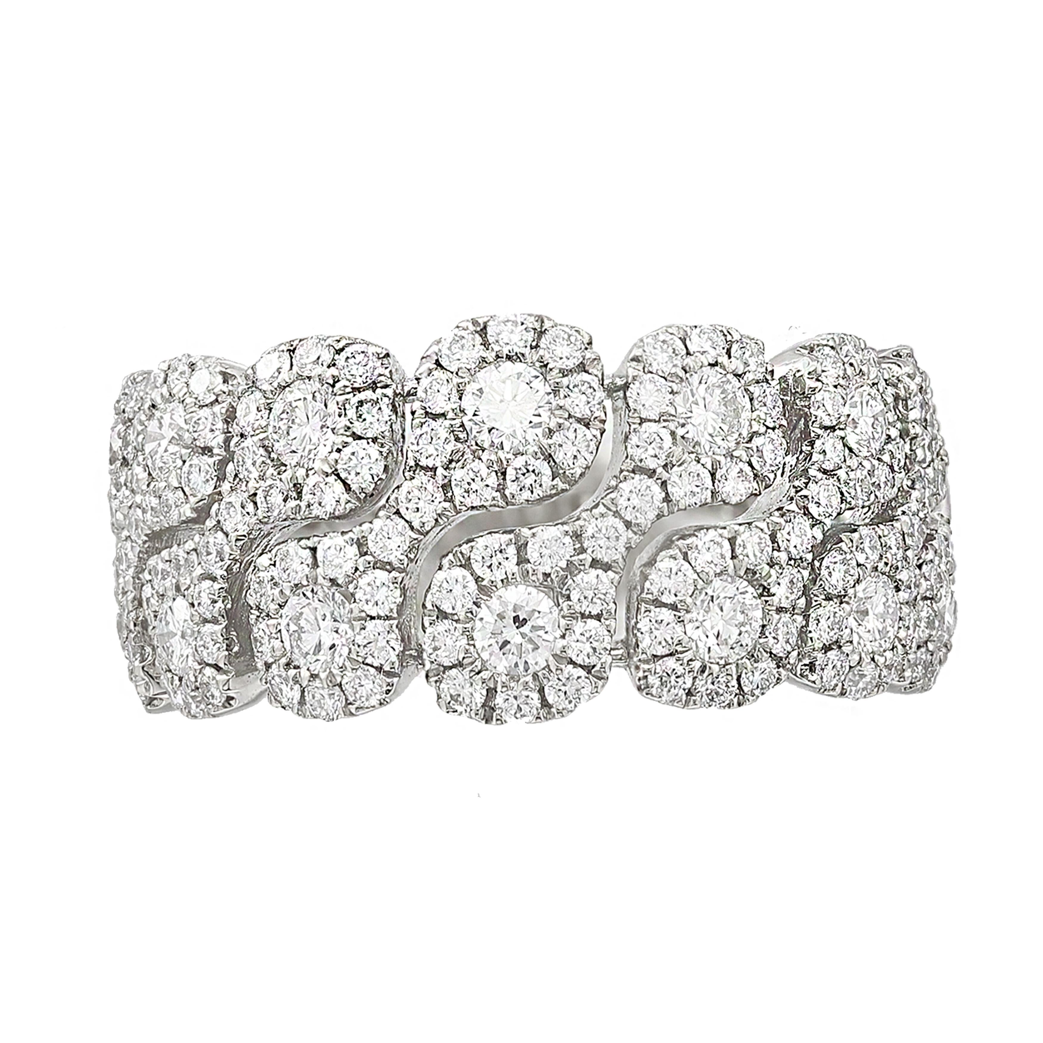 A magnificent and unique piece of jewelry showcasing fancy round diamonds set in an open-work, floating diamond design made in 18K White gold. 154 Diamonds weigh 1.24 carats total. 

Size 6.5 US (Sizable). 
All diamonds are GH color SI1