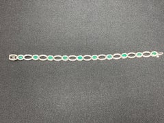 2.13 Carat Oval Cut Emerald and Diamond 14K White Gold Tennis Bracelet