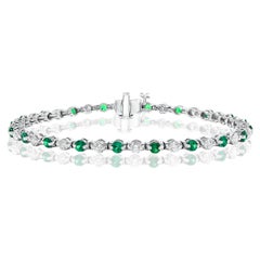 Bracciale Grandeur con smeraldo rotondo e diamanti da 2,24 carati in oro bianco 14K