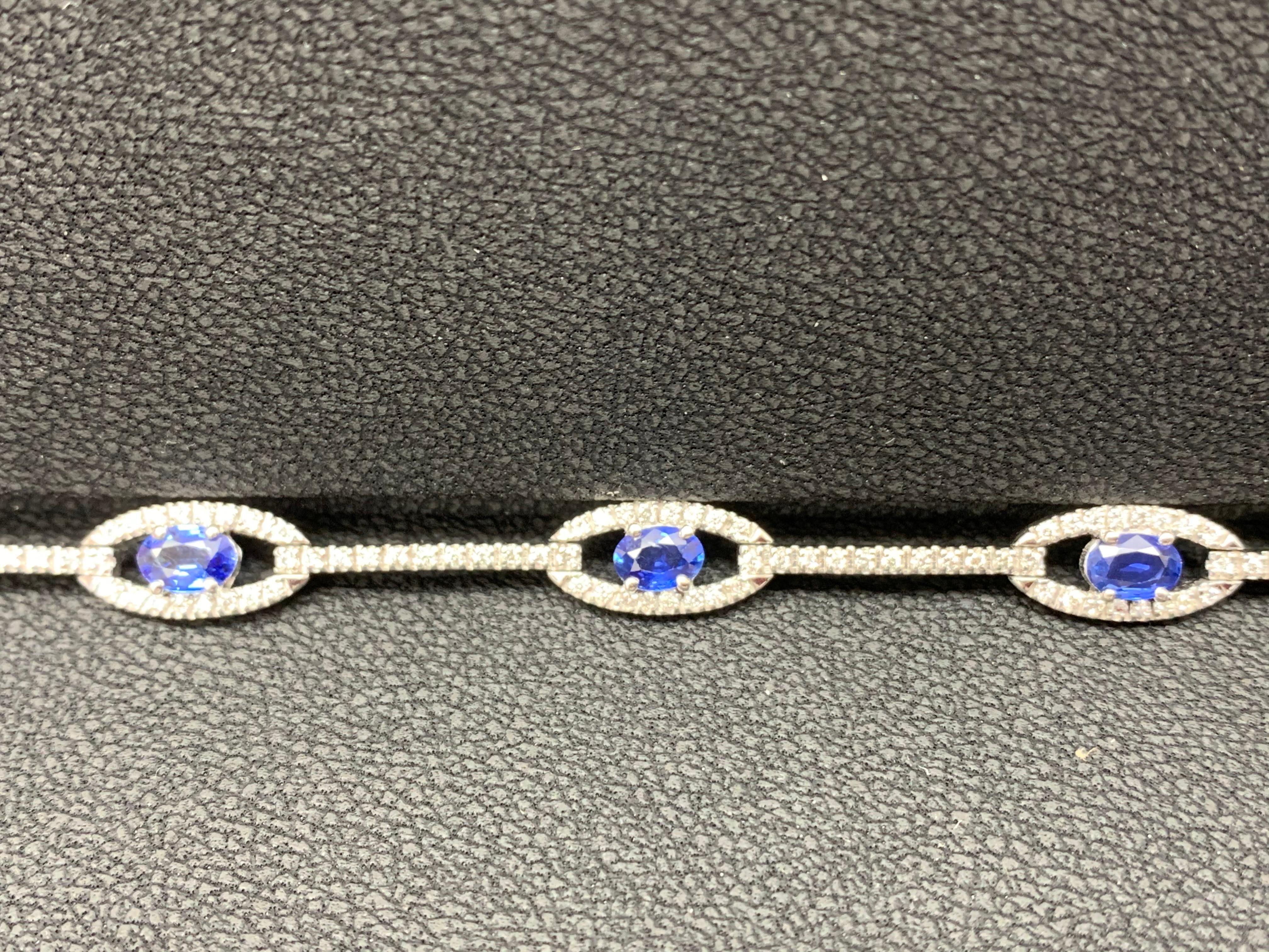 Oval Cut 2.46 Carat Oval Blue Sapphire and Diamond Encrusted Tennis Bracelet For Sale