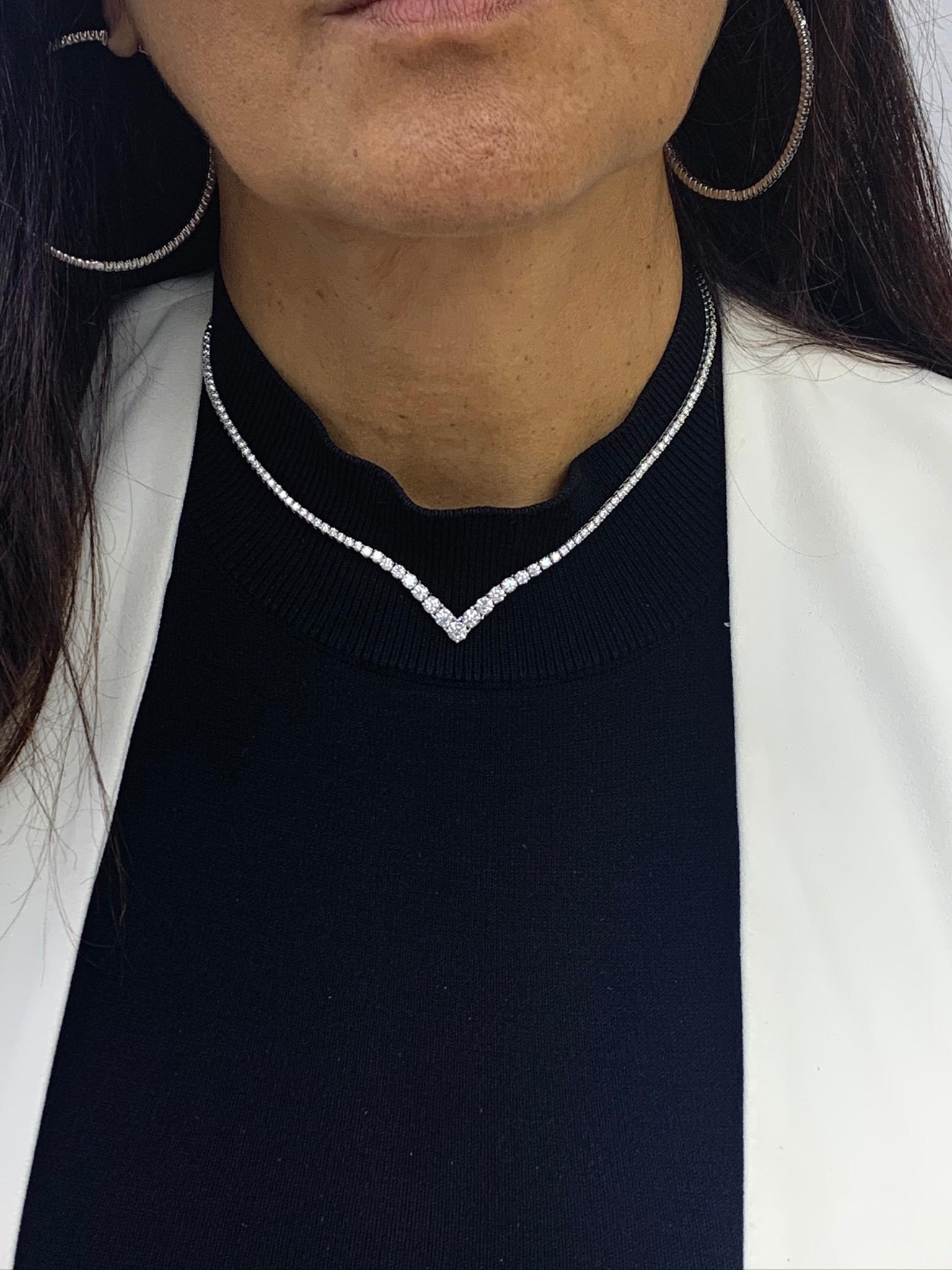 A simple yet very brilliant piece showcasing round diamonds that elegantly graduate larger as it reaches the center of the necklace. 85 Diamonds weigh 5.05 carats total and are very fine quality Made in 14k White Gold. 17 inches in length. Box Clasp