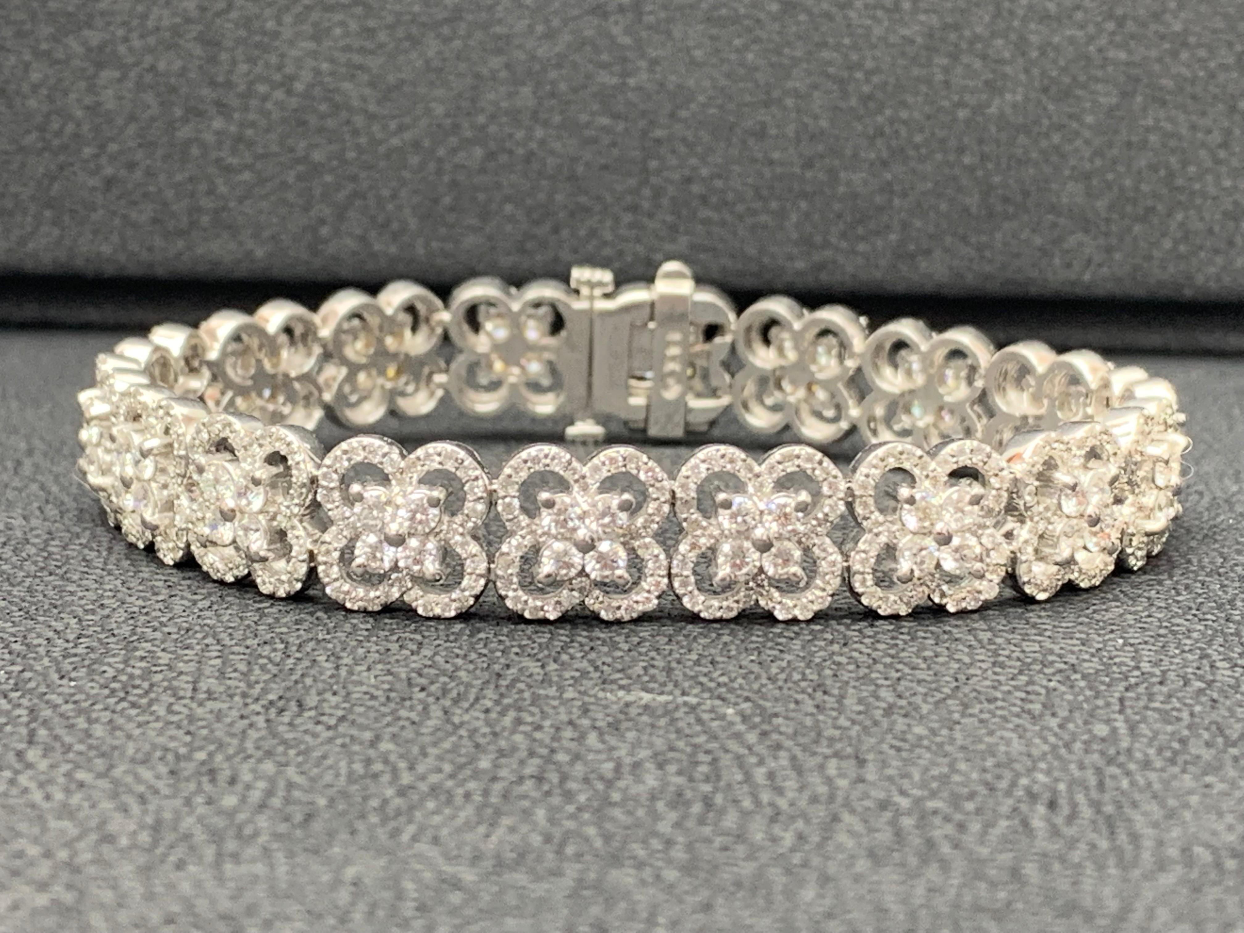 Bracelet set with round brilliants diamonds set in a floral motif. 640 Diamonds weigh 6.03 carats. Box clasp with double lock mechanism.
 
All diamonds are GH color SI1 Clarity.
Can be made in Yellow and Rose gold.
Style available in different price