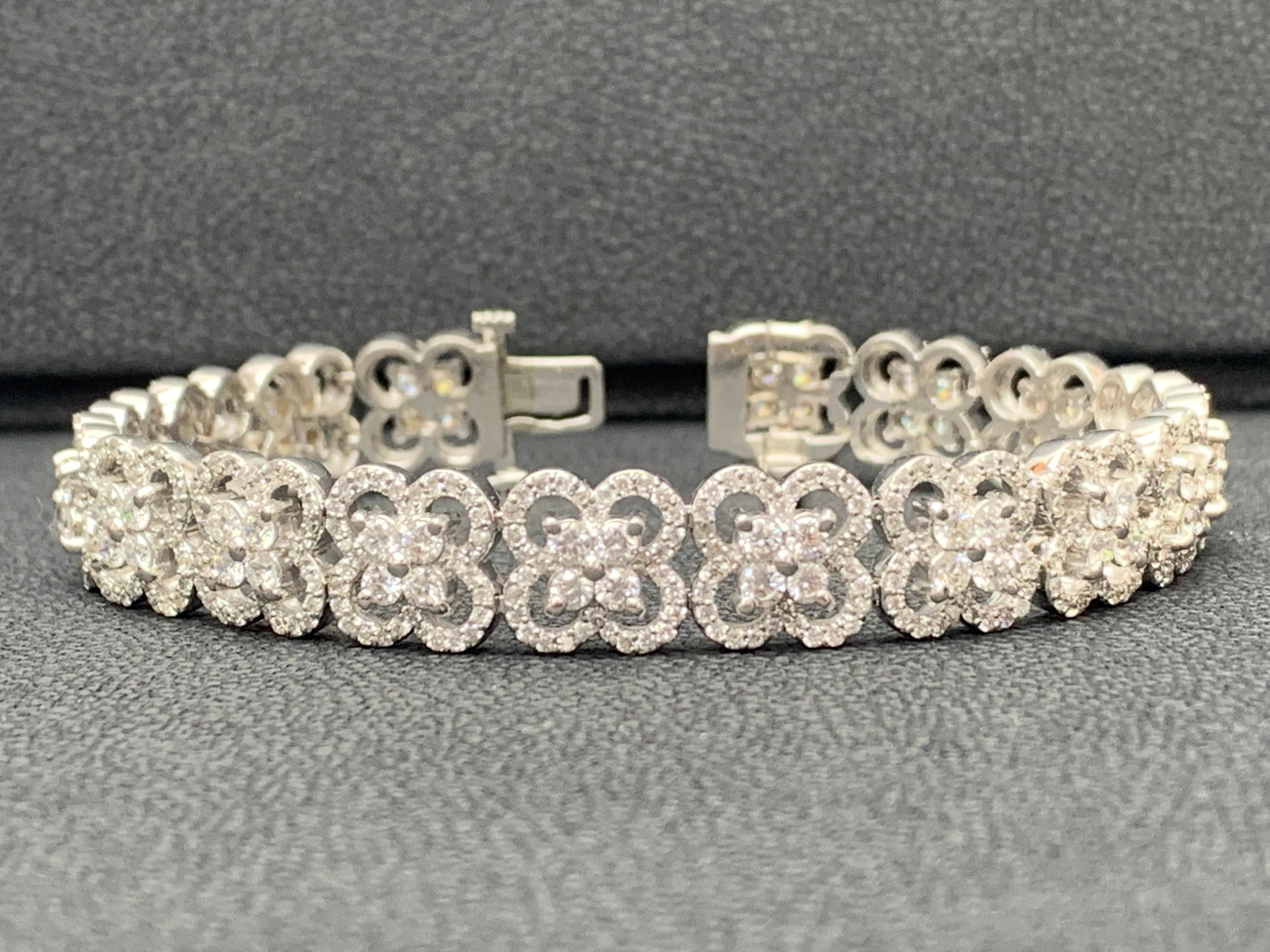 Modern 6.03 Carat Round Cut Flower Diamond Tennis Bracelet in 14K White Gold For Sale
