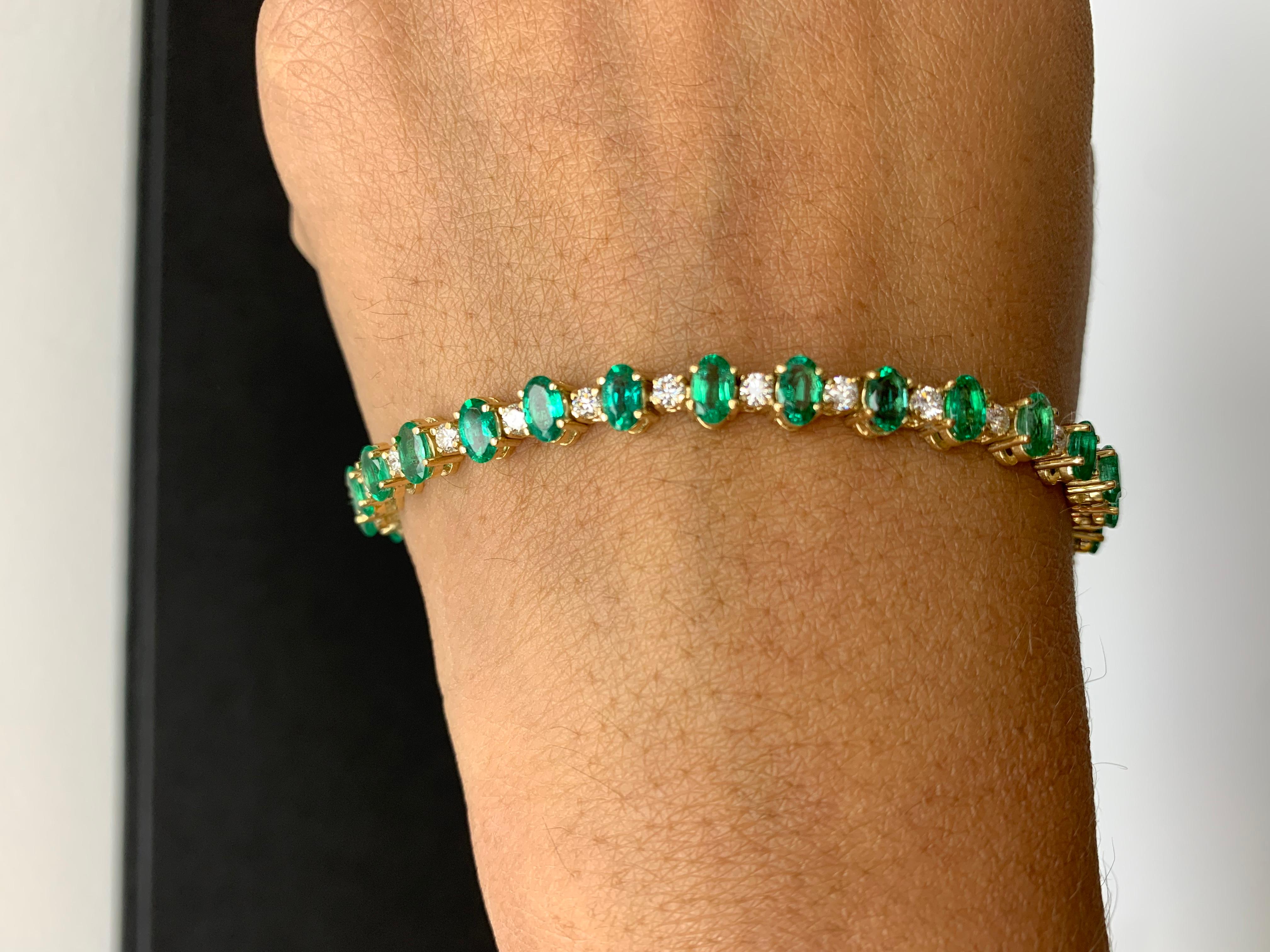 Modern Grandeur 6.30 Carats Oval Cut Emeralds and Diamond Bracelet in 14k Yellow Gold For Sale