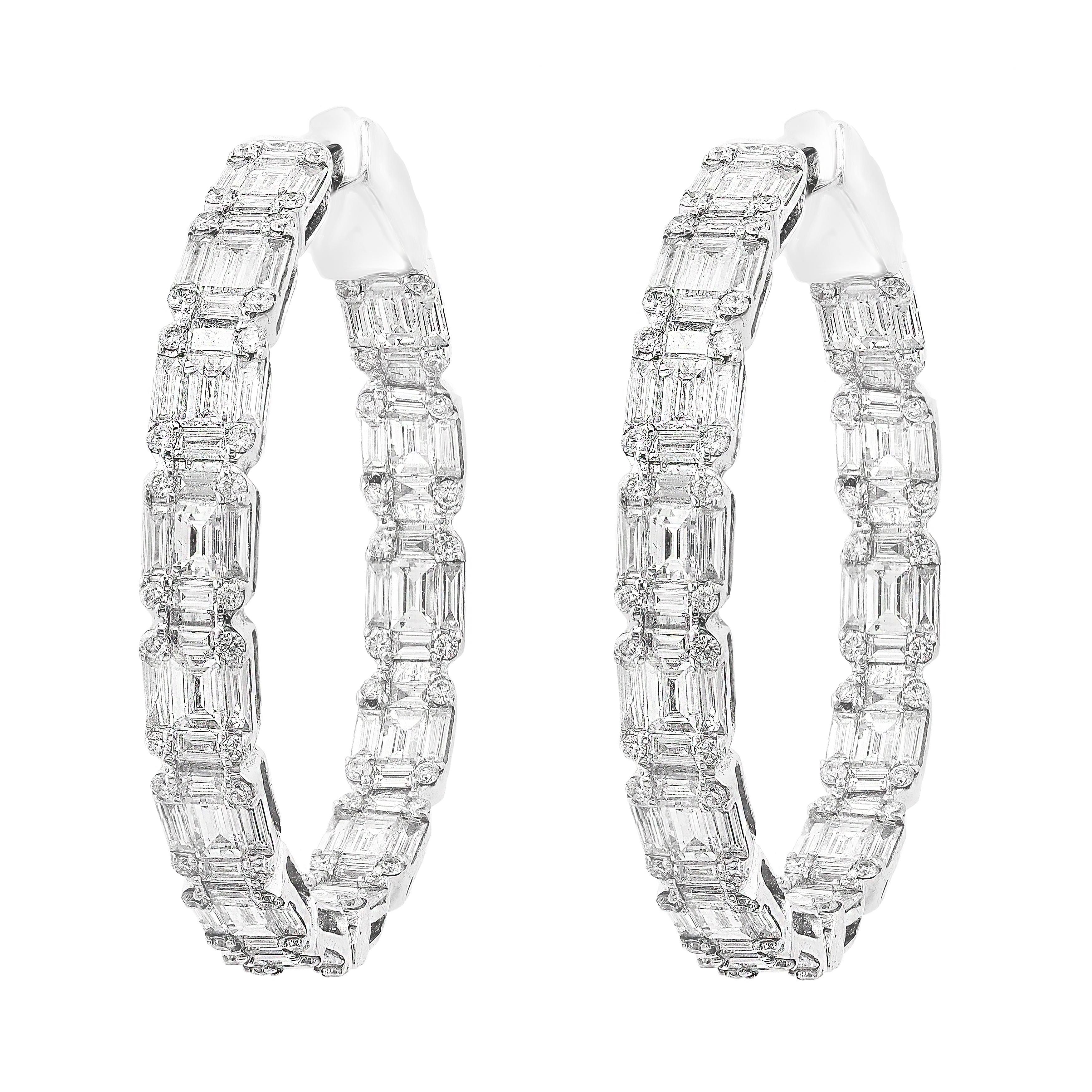 Gorgeous and classic diamond hoop earrings. Features dazzling baguette and round diamonds set in shared prongs to maximize the brilliance of the diamonds. Total weight of the Baguette Diamonds is 6.46 carat and Round Diamonds is 1.09 Carat. Made in