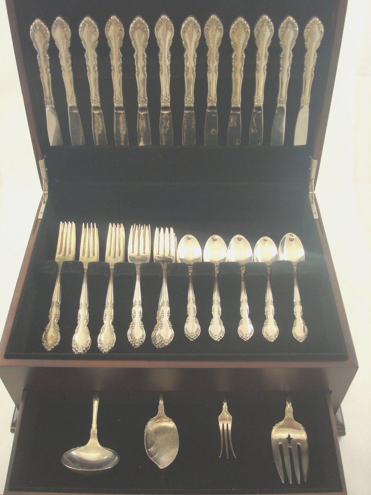 Outstanding Grandeur by Oneida sterling silver flatware set - 52 pieces. This set includes:

12 knives, 9