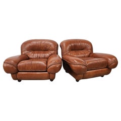 Grandes sillones de cuero coñac años 70