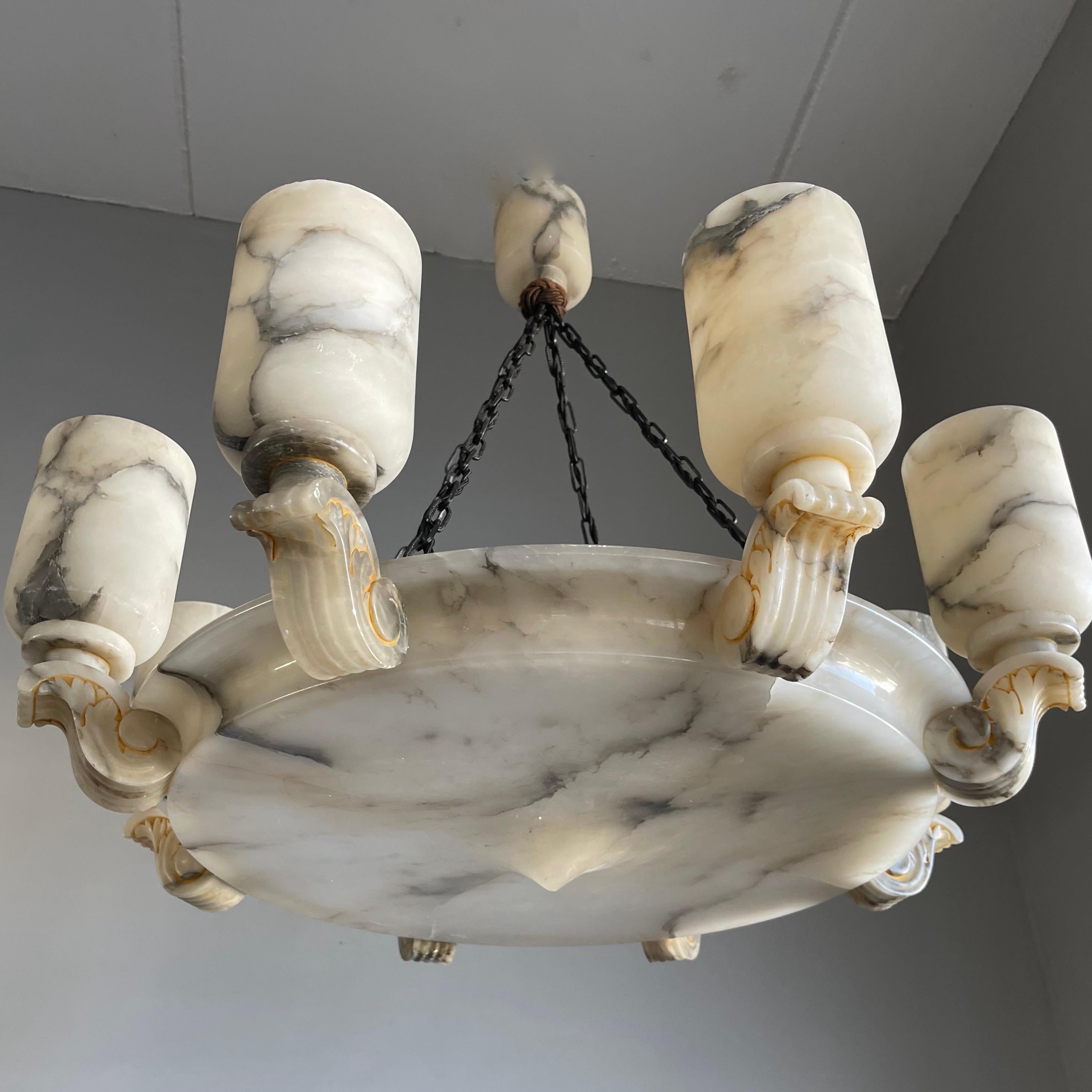 Early twentieth century, majestic, pure Art Deco, work-of-art light fixture.

With early 20th century lighting in general (and alabaster fixtures in particular) as one of our specialities, we were again amazed to find a completely unique and highly