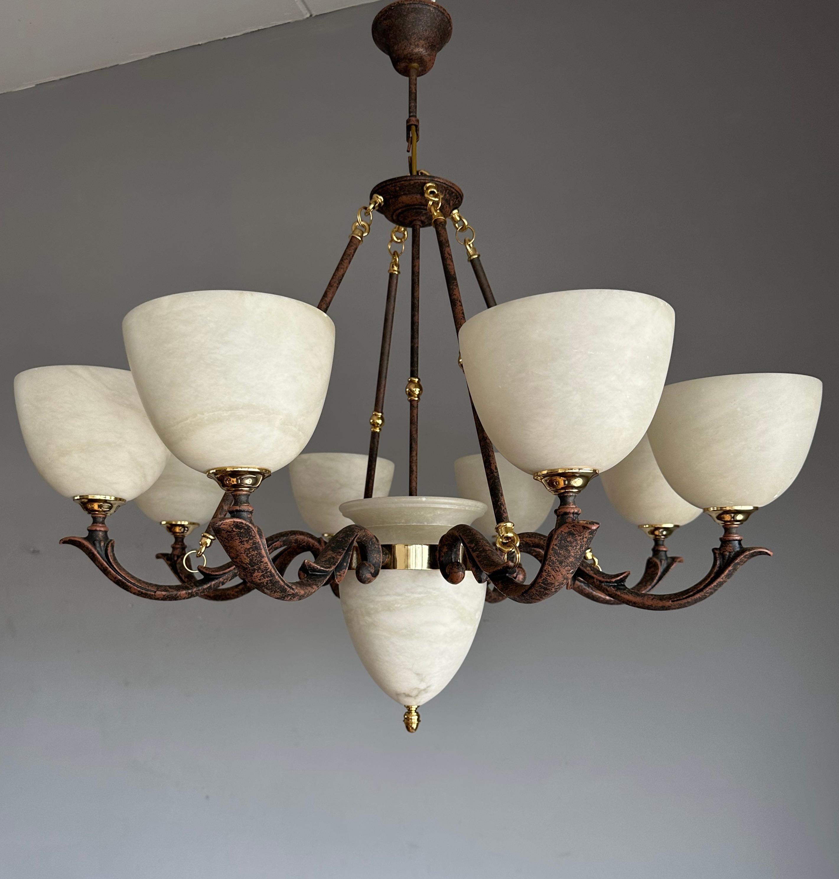 Vintage majestic, work-of-art light fixture.

With 20th century lighting in general (and alabaster fixtures in particular) as one of our specialities, we were again amazed to find a completely unique and highly stylish, alabaster chandelier. This