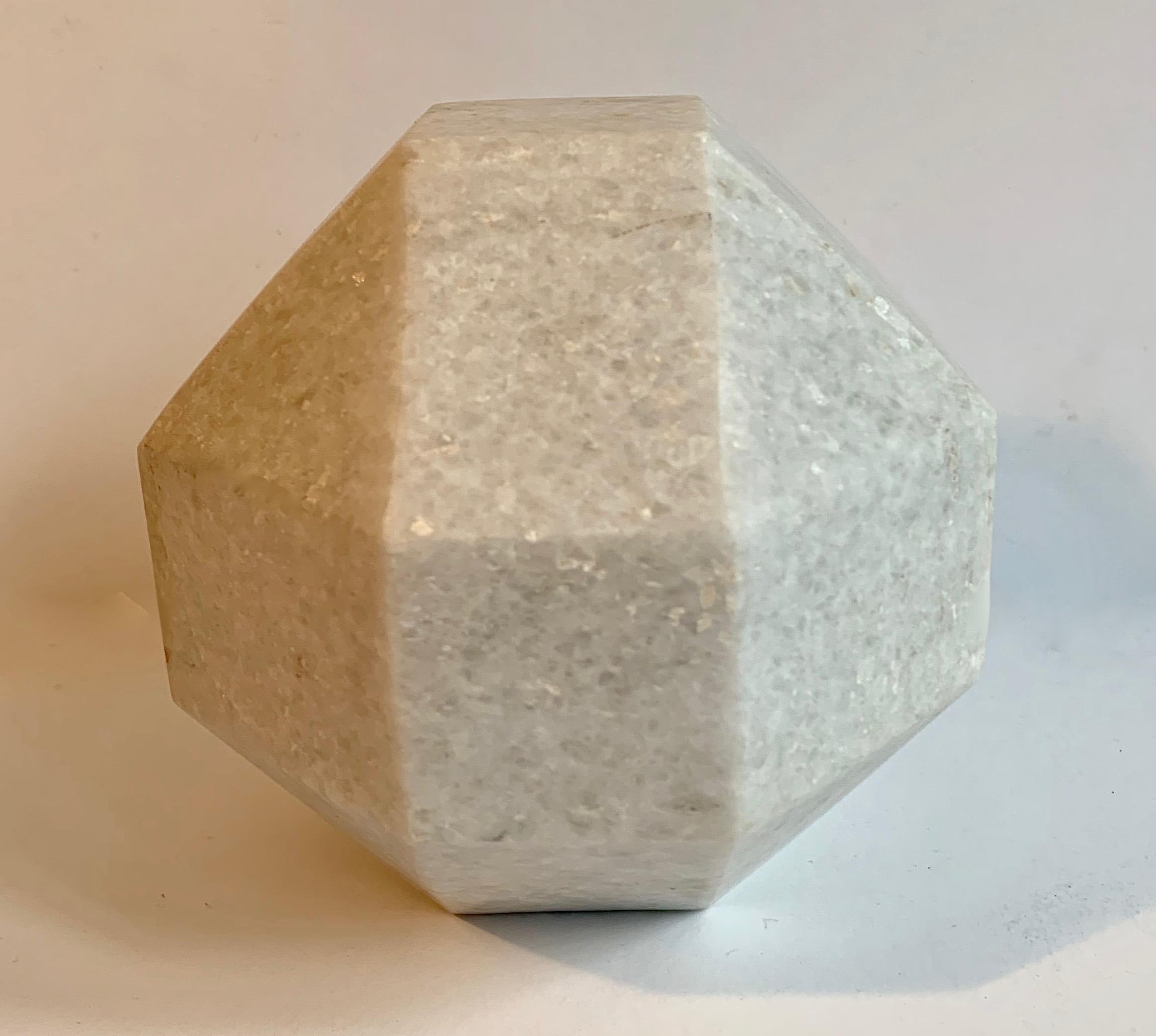 Solid granite paper weight - very clean, architectural and geometrical piece with 18 sides... a good weight for holding down important papers or simply decorating your space.