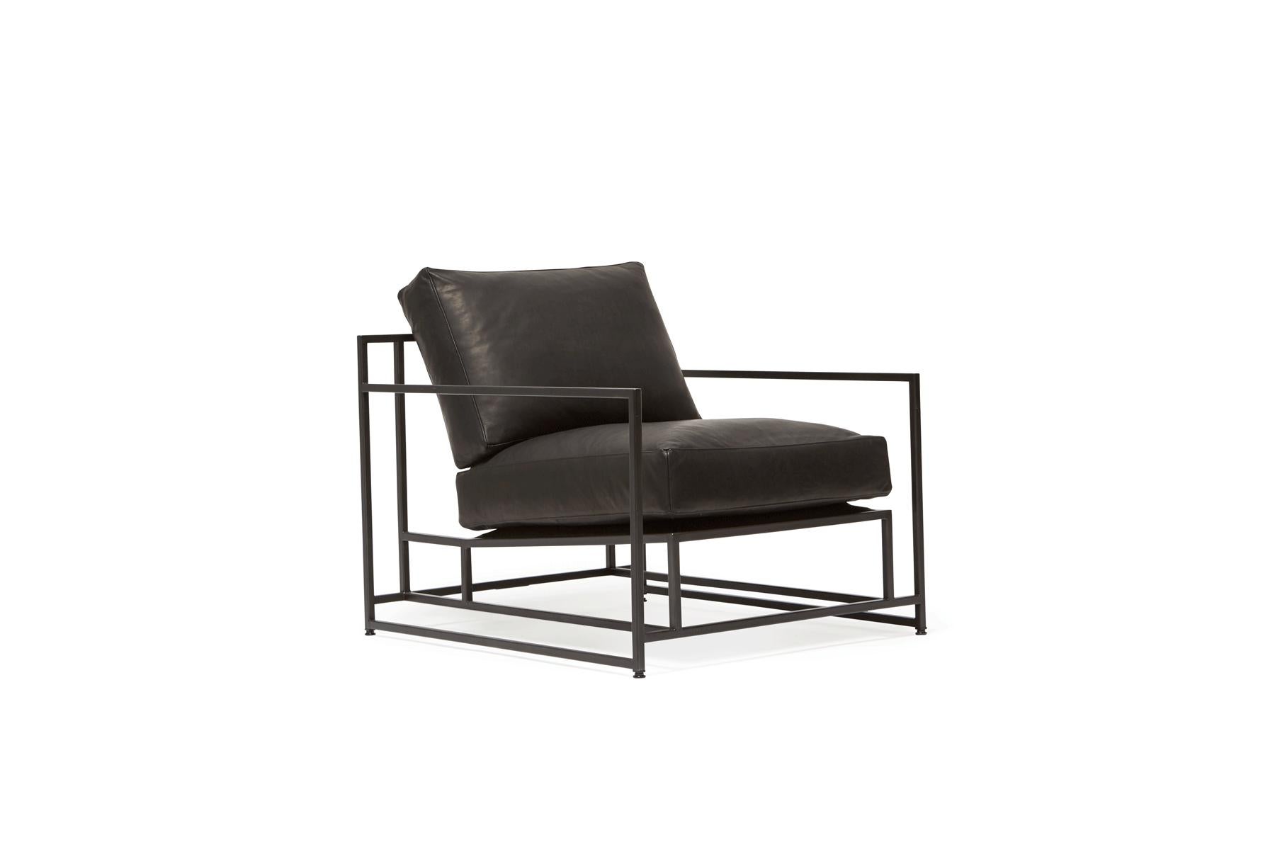 The Inheritance Armchair by Stephen Kenn is as comfortable as it is unique. The design features an exposed construction composed of three elements - a steel frame, plush upholstery, and supportive belts. The deep seating area is perfect for a