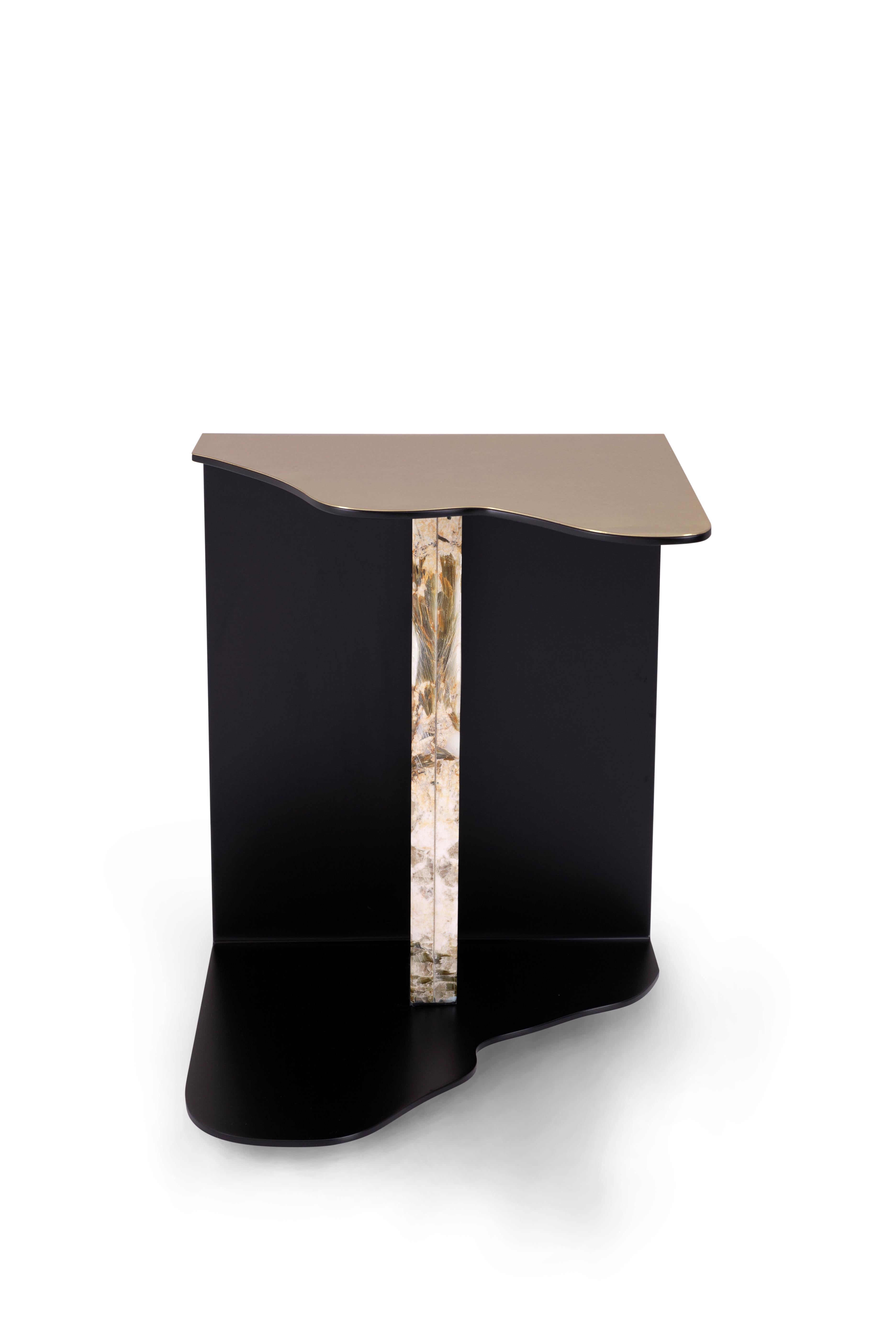 Granite side table by Green Apple
Dimensions: Ø 38 x 42 cm
Materials: black lacquer; satin finish
Brushed brass; high-gloss finish
Patagonia granite; polished

Metal side table outer shell in brushed brass with a high-gloss finish and inner