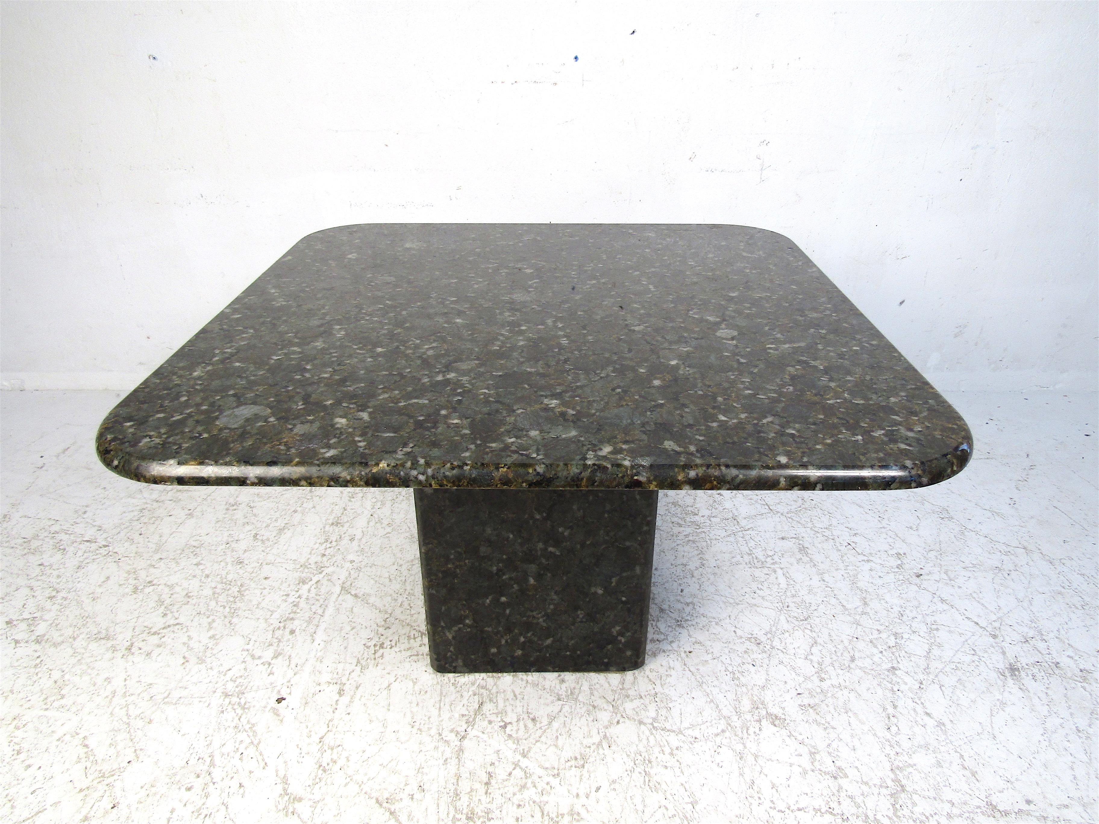 This compact yet bold table will help create an oasis in any outdoor space. Made from solid granite with a super polished finish this piece will hold up for years to come while adding a true level of sophistication to your outdoor entertainment