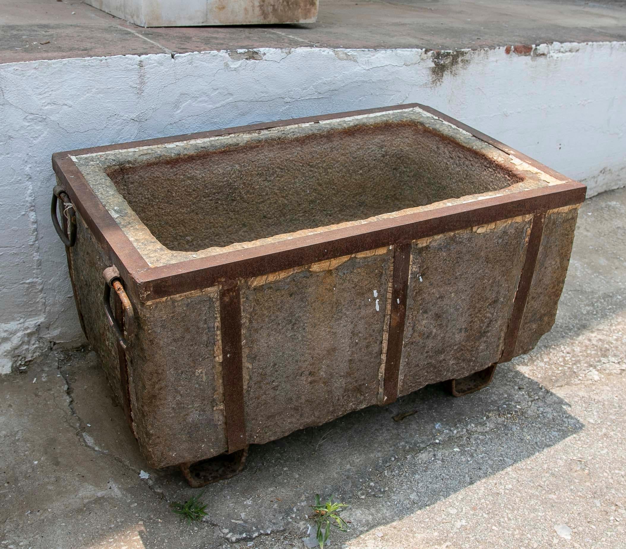 Spanish Granite Trough with Iron Protection Structure with Handles and Legs For Sale