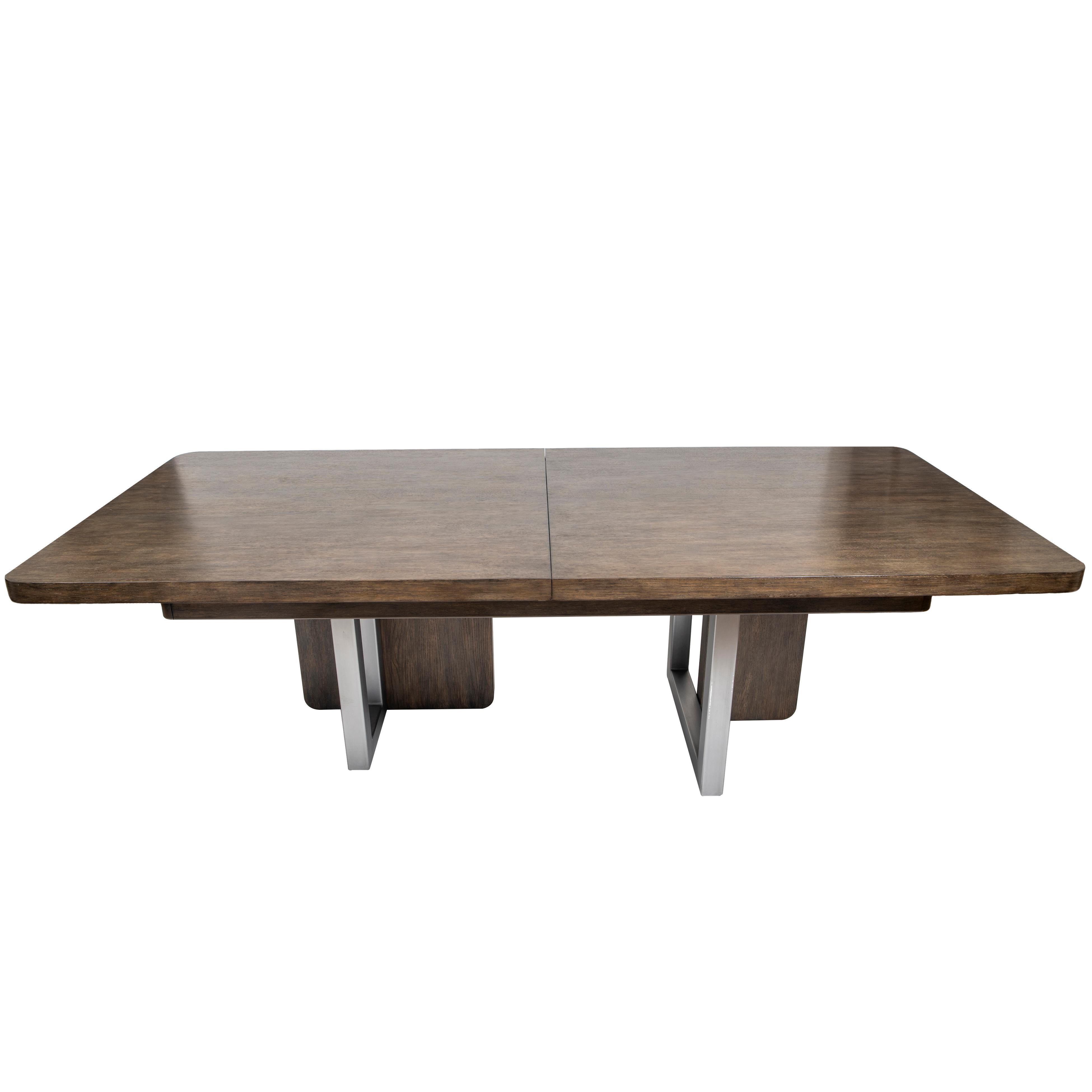 Comfortably seats 8-10 people, elegant mix of wood and metal, grounding presence for any dining room space.

Dimensions: 96