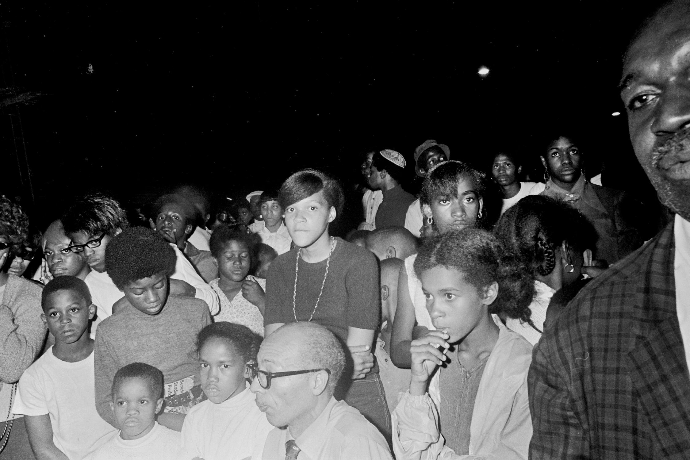 Grant Harper Reid Black and White Photograph - Crowd Gathered to See Jimi Hendrix in Harlem Fine Art Print