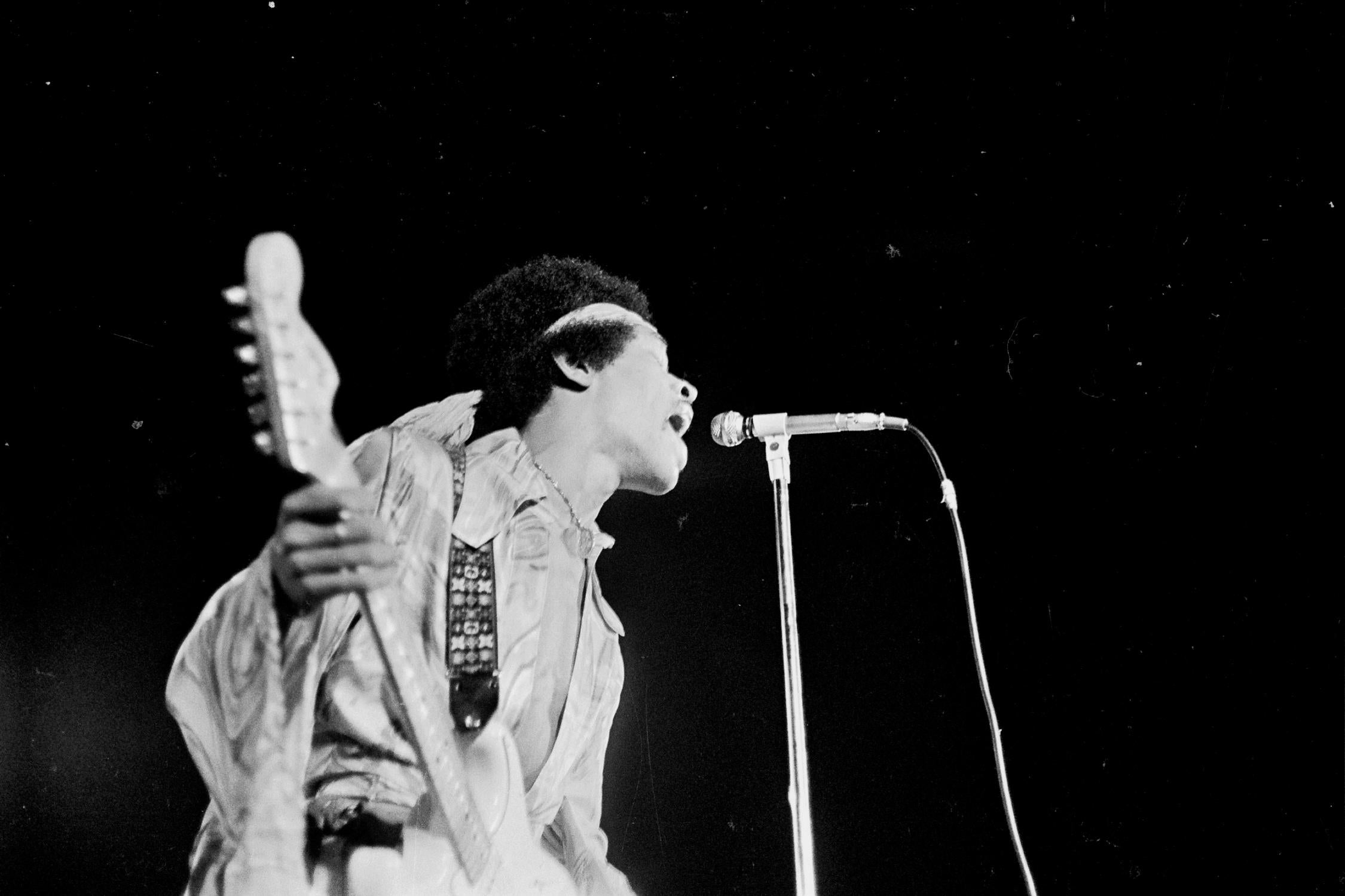Grant Harper Reid Black and White Photograph - Jimi Hendrix Passionately Singing on Stage in Harlem Fine Art Print