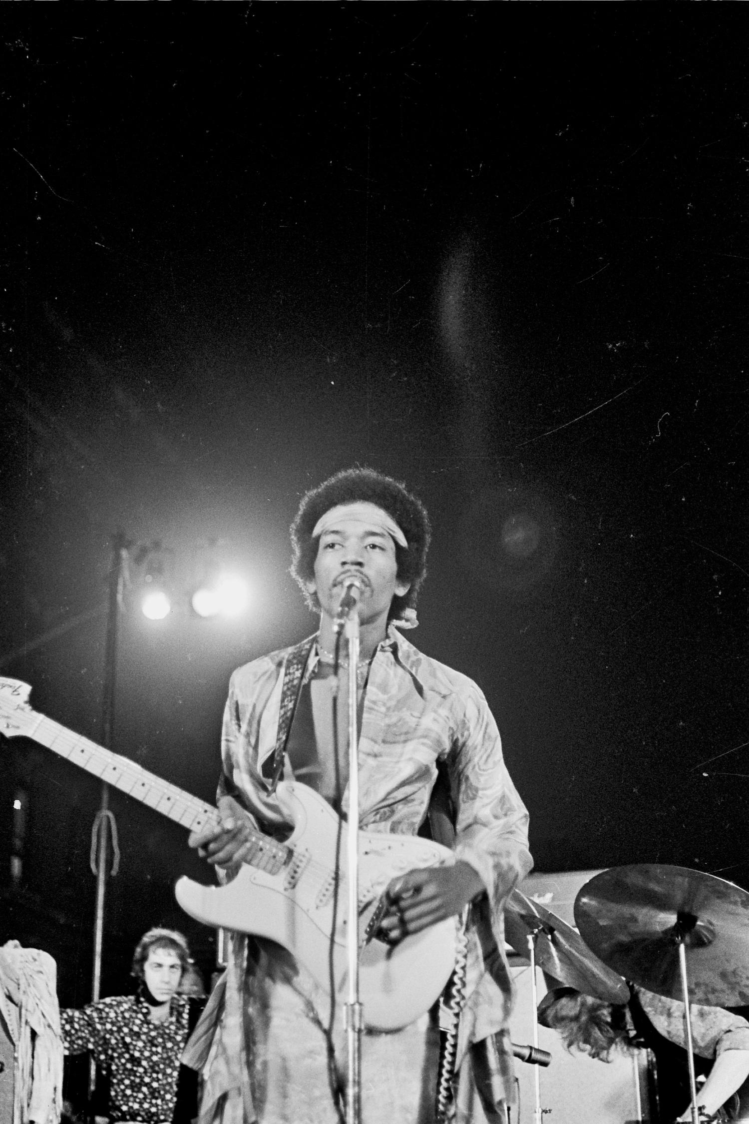 Grant Harper Reid Black and White Photograph - Jimi Hendrix Performing on Stage Looking Up Fine Art Print