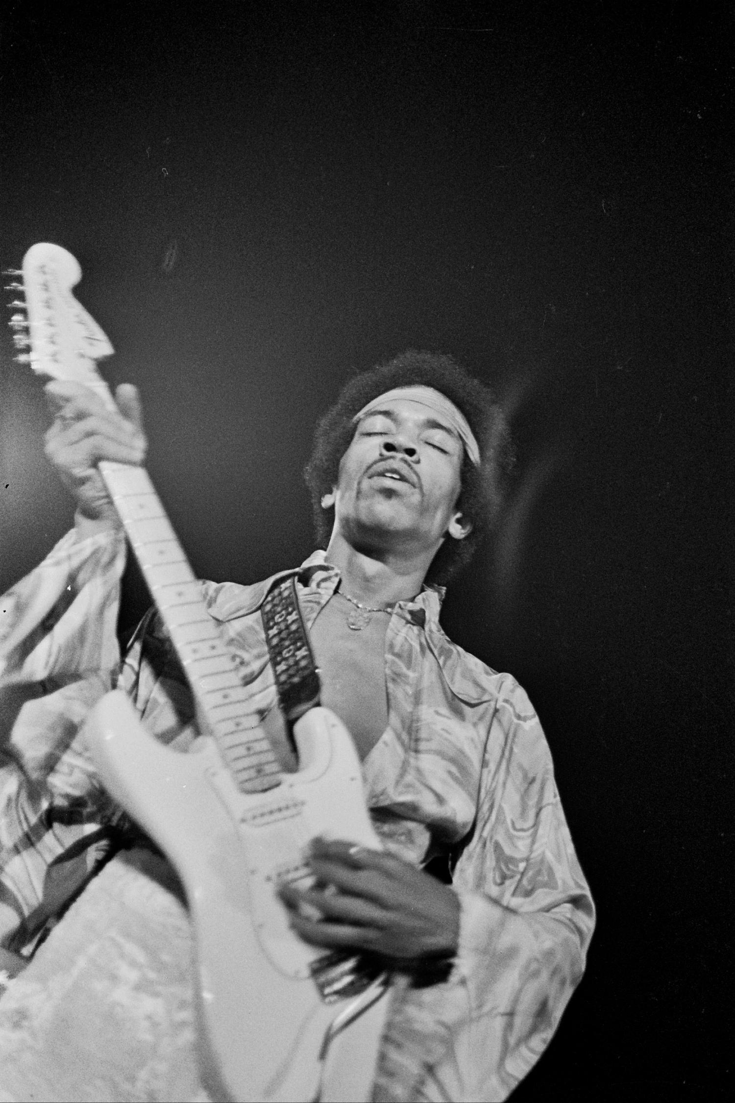 Grant Harper Reid Portrait Photograph - Jimi Hendrix Performing on Stage With Eyes Closed Fine Art Print