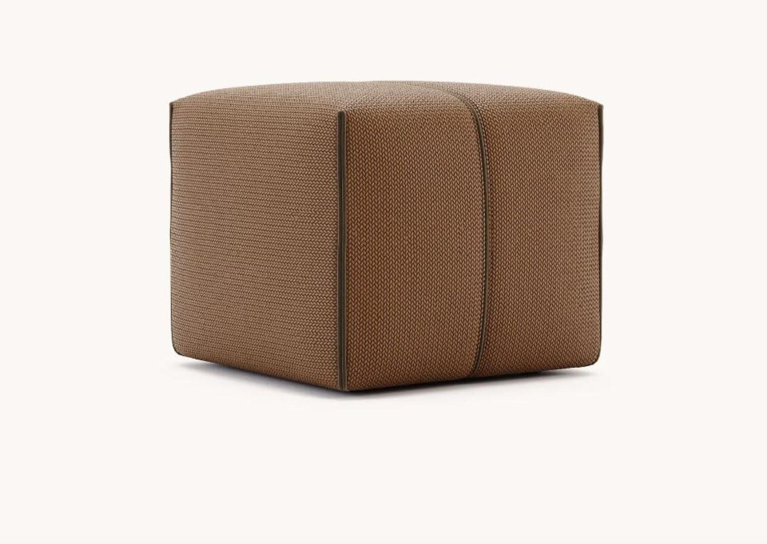 Grant S Pouf by Domkapa
Materials: velvet, synthetic leather.
Dimensions: W 45 x D 45 x H 40 cm. 
Also available in different materials. 

The construction of Grant pouf skillfully combines aesthetics and ergonomics to establish this as the