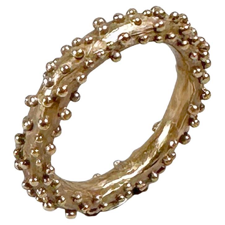 Anello scolpito Granuli Band M in bronzo di Lo Studiolo Genève