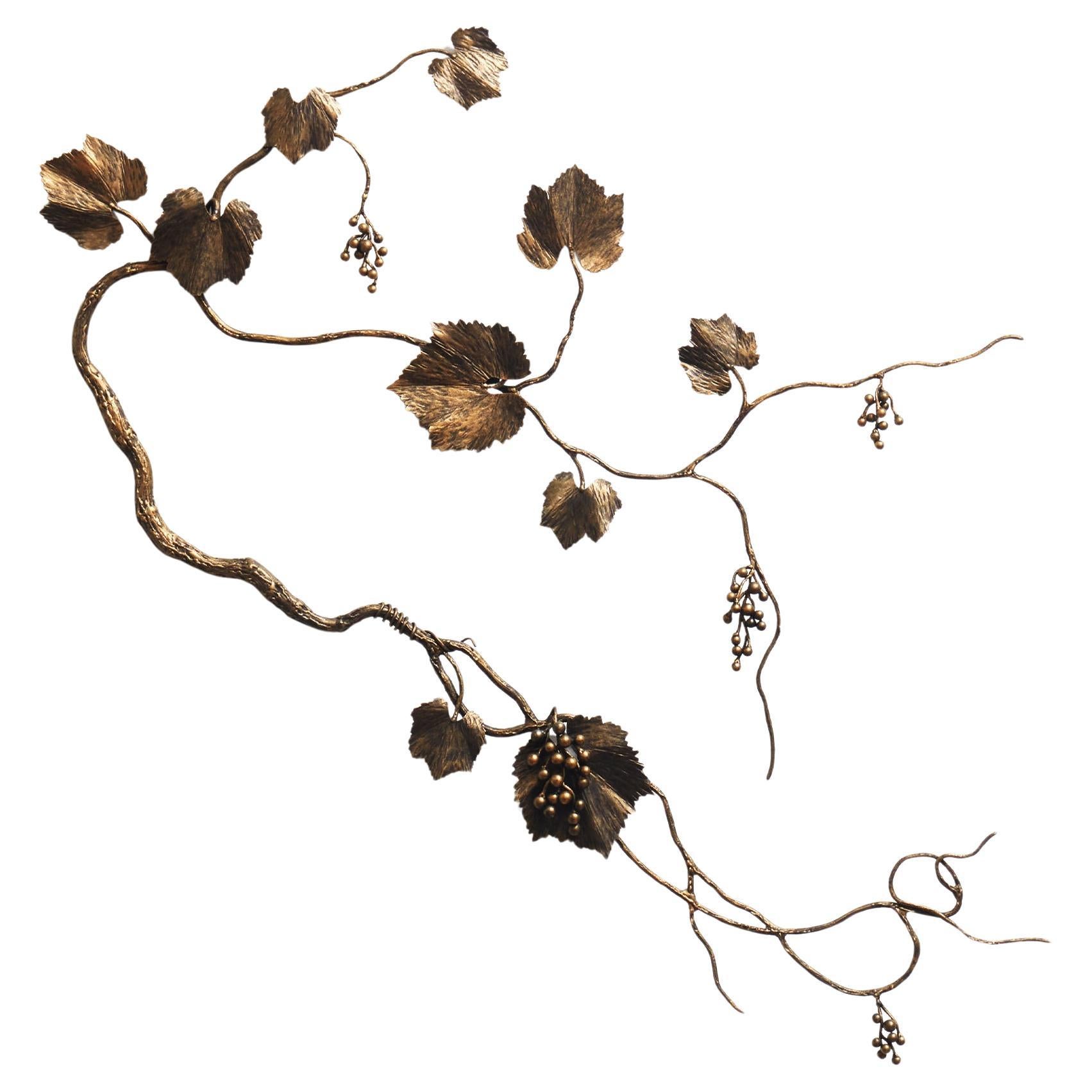 Sculpture murale en feuilles de vigne en tabac