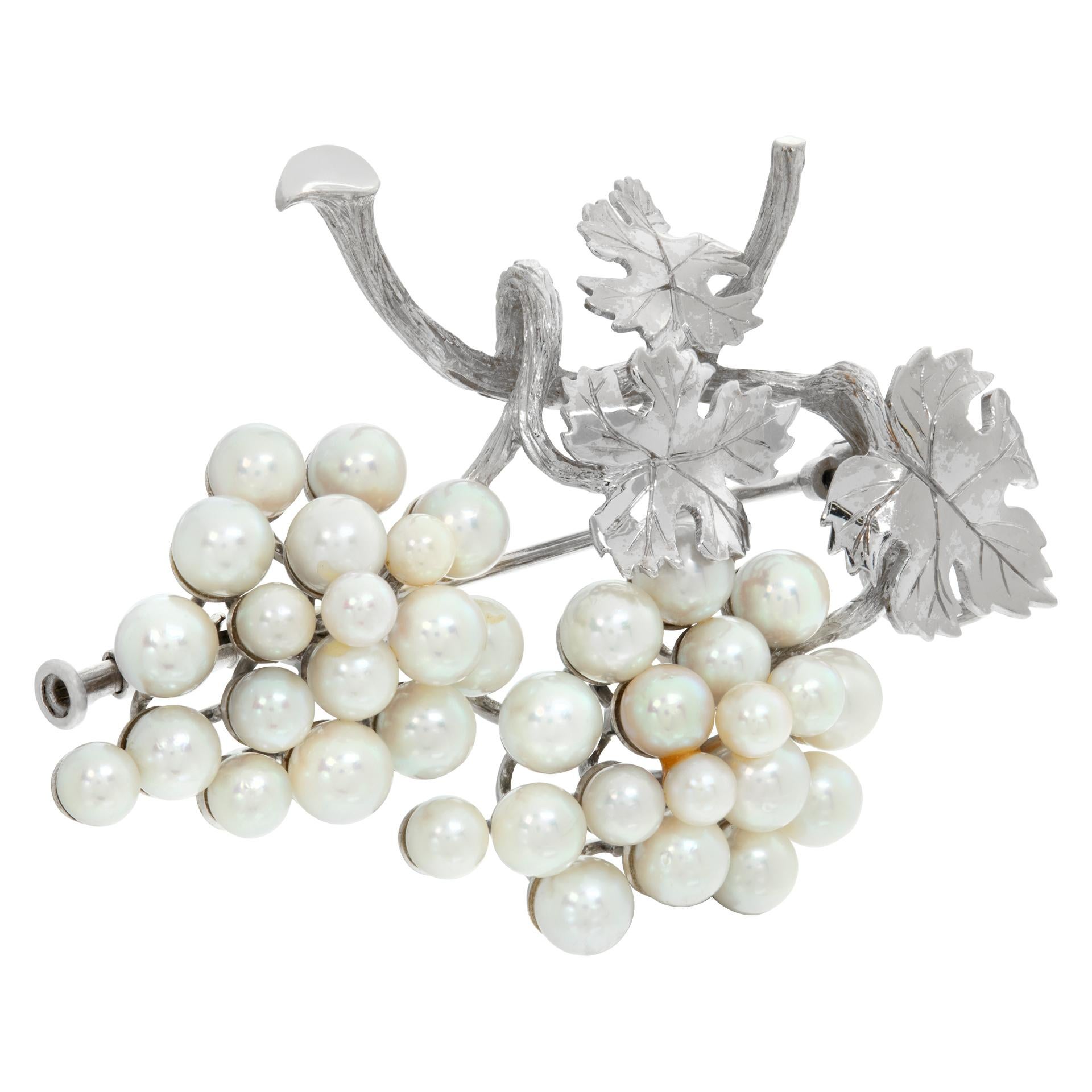 Grape vine design pearl brooch in 18k white gold. Measures 2 inches by 1.5 inches, pearl diameters 3mm - 5mm.
