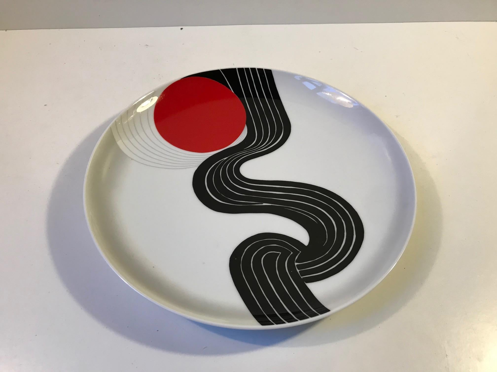 Wall hung porcelain plaque or dish with motif designed by Indian Graphic designer and artist Srivastava Narendra. This plaque is a part of a 600 pieces limited run by German Rosenthal in 1979.