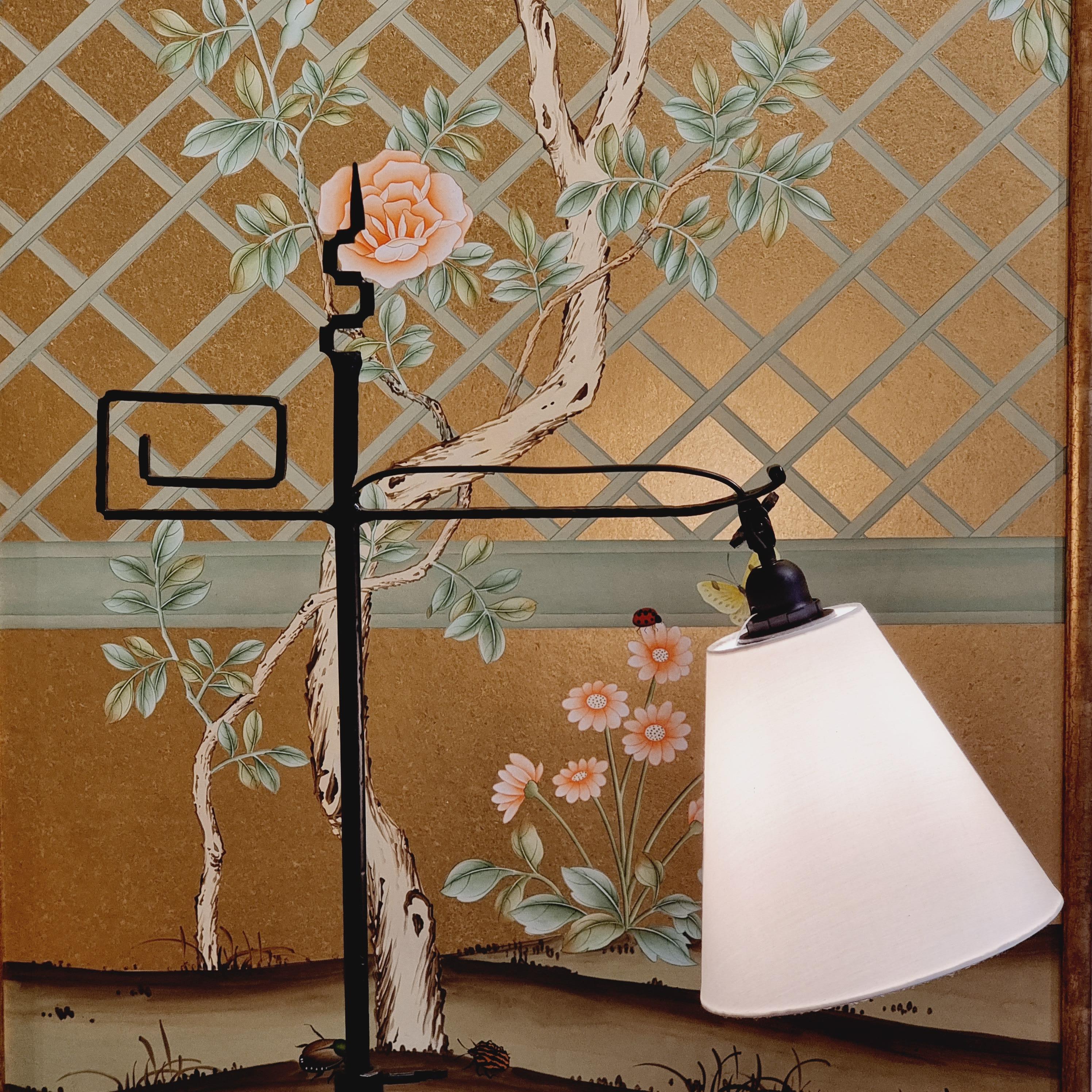 Unique, graphic floor lamp in wrought iron, breautiful details.

This floor lamp is as much as an artwork as functional light source. Re-wired (Swedish standard). Adjustable height ca 120-160 cm. 

In perfect condition, with nice patina.