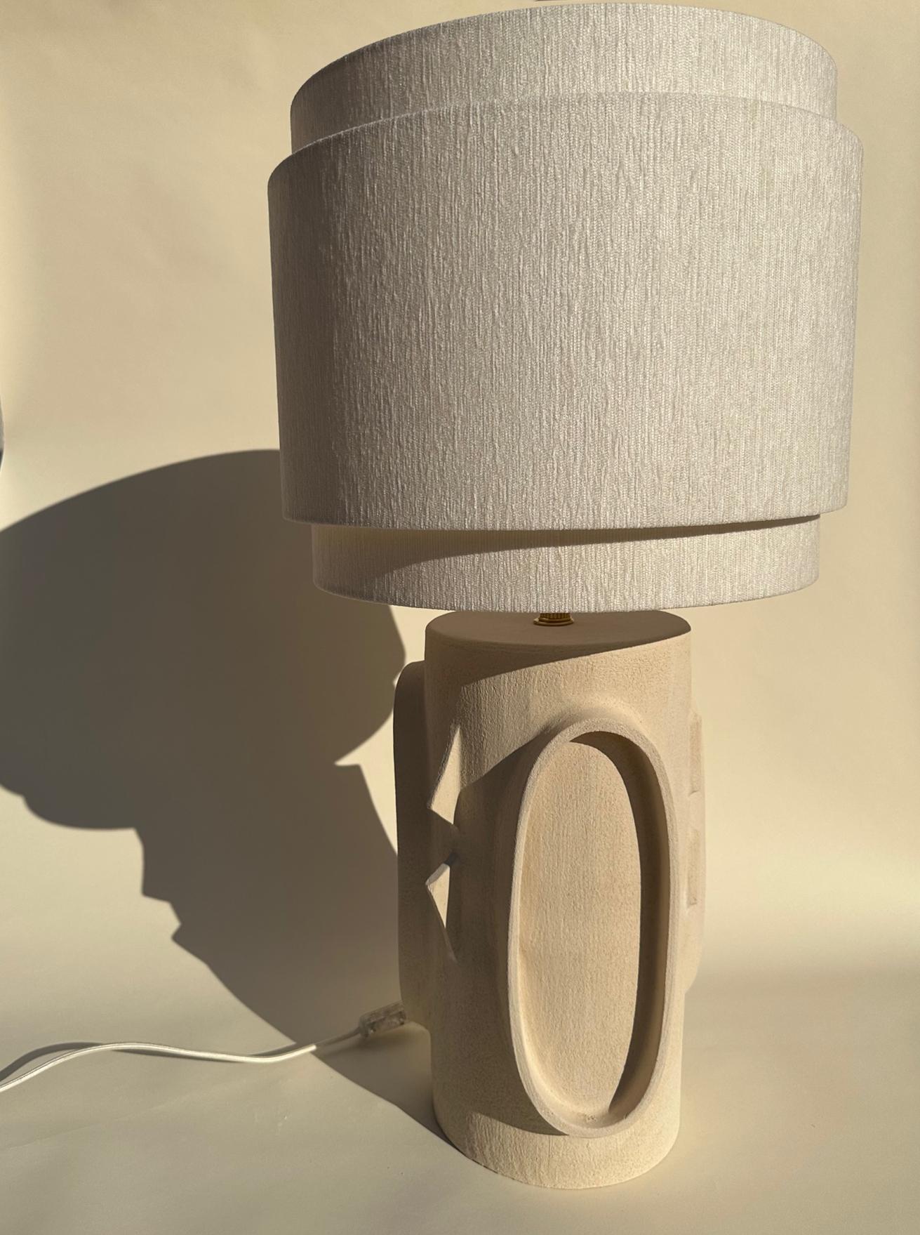 Graphic Table Lamp by Olivia Cognet
Dimensions: Base: D 25 x H 50 cm, Shade: 40 x 40 cm, Total Height: 100 cm.
Materials: Ceramic.

Since moving to Los Angeles in 2016, French artist and designer Olivia Cognet has focused on ceramics as the fertile