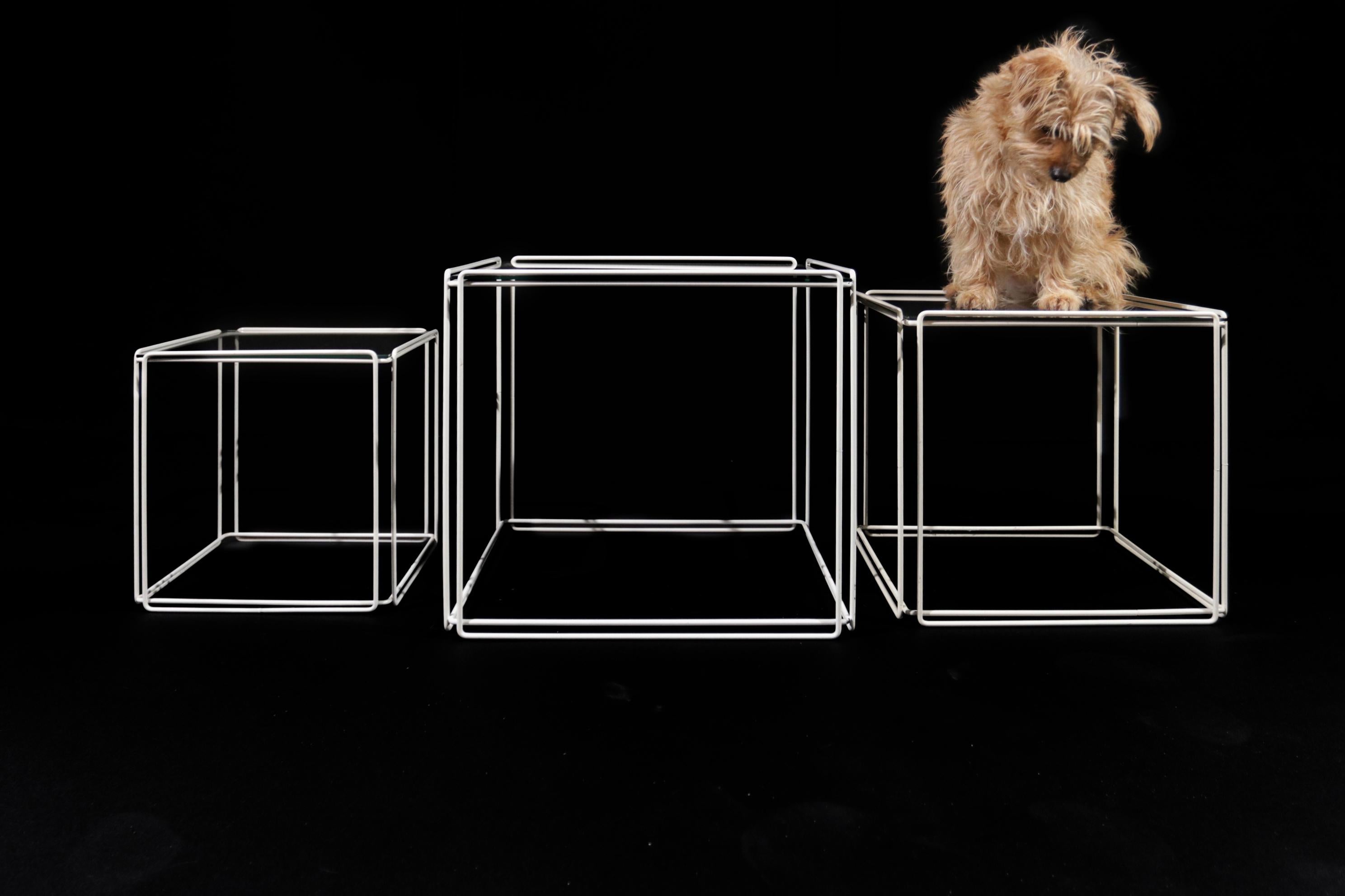 Set of 3 France Isocele Nesting tables designed by Max Sauze (1933-) for Attrow 1970s.
Made of glass and steel. White frame.
Minimal signs of use consistent with the age of these tables.