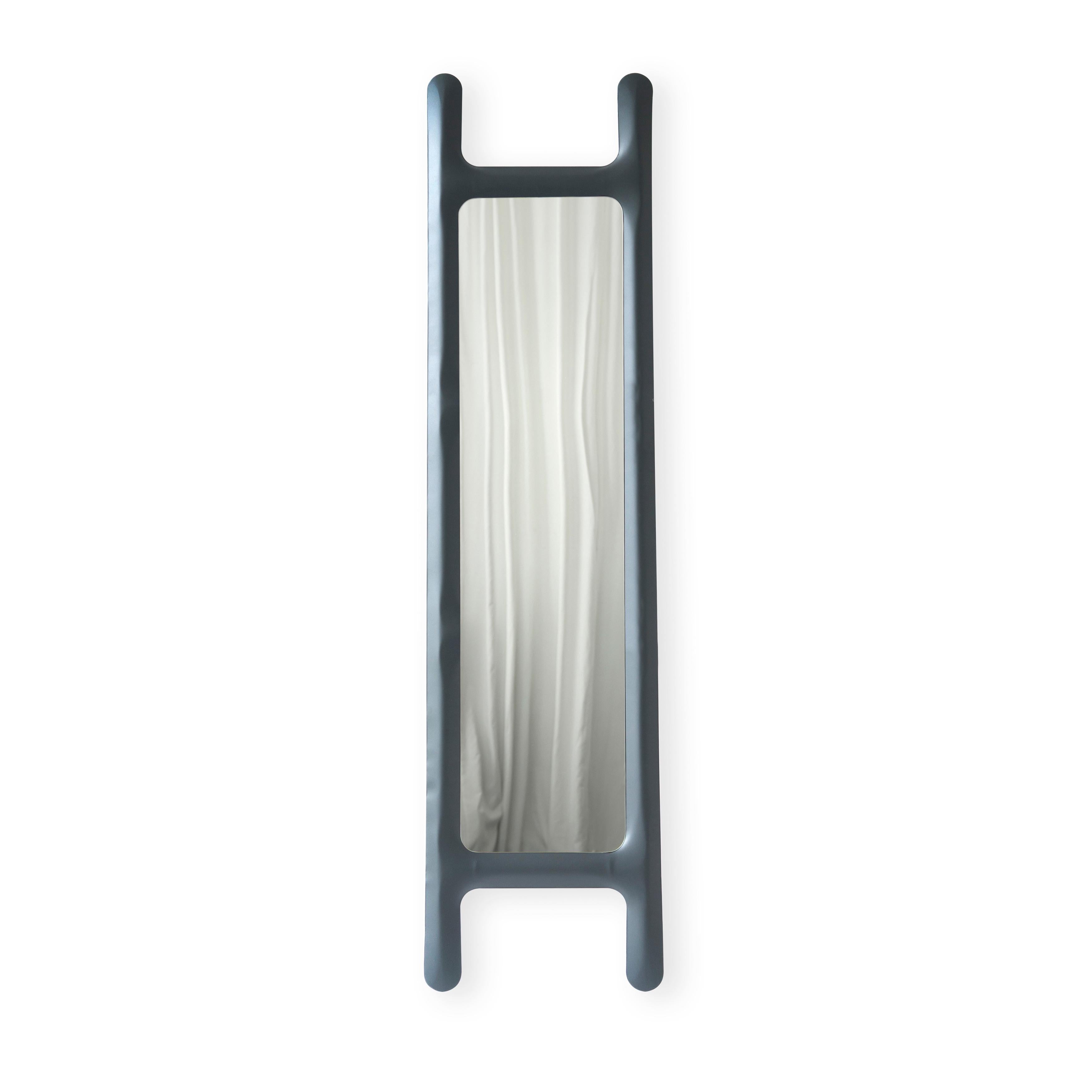 Graphite drab sculptural wall mirror by Zieta
Dimensions: D 6 x W 46 x H 188 cm 
Material: Mirror, carbon steel. 
Finish: Powder-coated in graphite grey matt.
Also available in colors: stainless steel, or powder-coated. 


A DRAB mirror is an