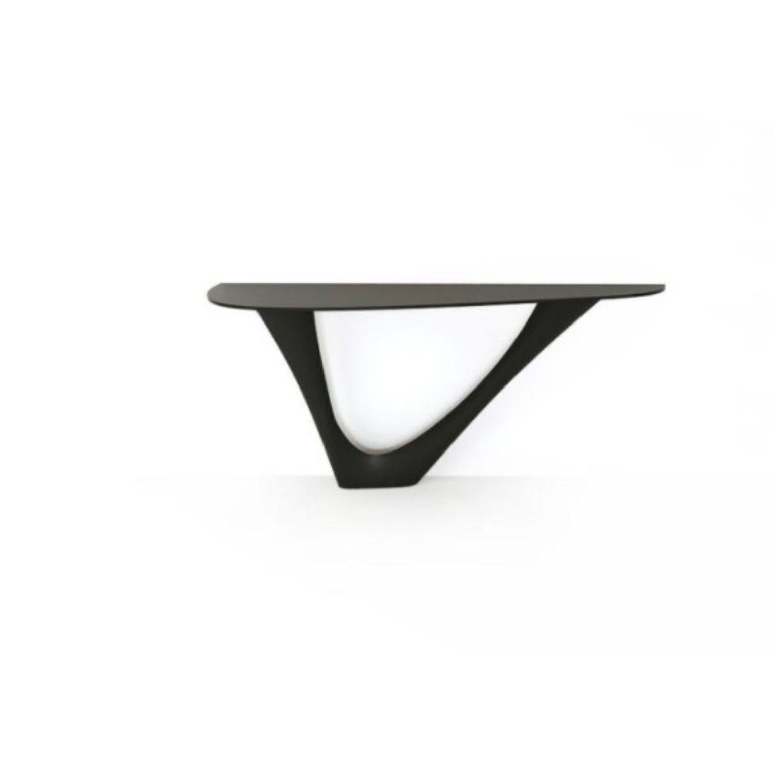 Graphite G-Console steel base with steel top Mono by Zieta
Dimensions: D 43 x W 159 x H 75 cm 
Material: Carbon steel.
Also available in different colors and dimensions.

G-Console is another bionic object in our collection. Created for smaller