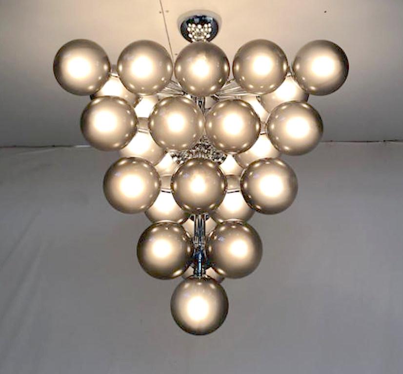Italian chandelier with frosted smoky Murano glass globes mounted on polished chrome metal finish frame / designed by Fabio Bergomi for Fabio Ltd, made in Italy
31-light / E12 or E14 type / max 40W each
Measures: Diameter 31.5 inches, height 34