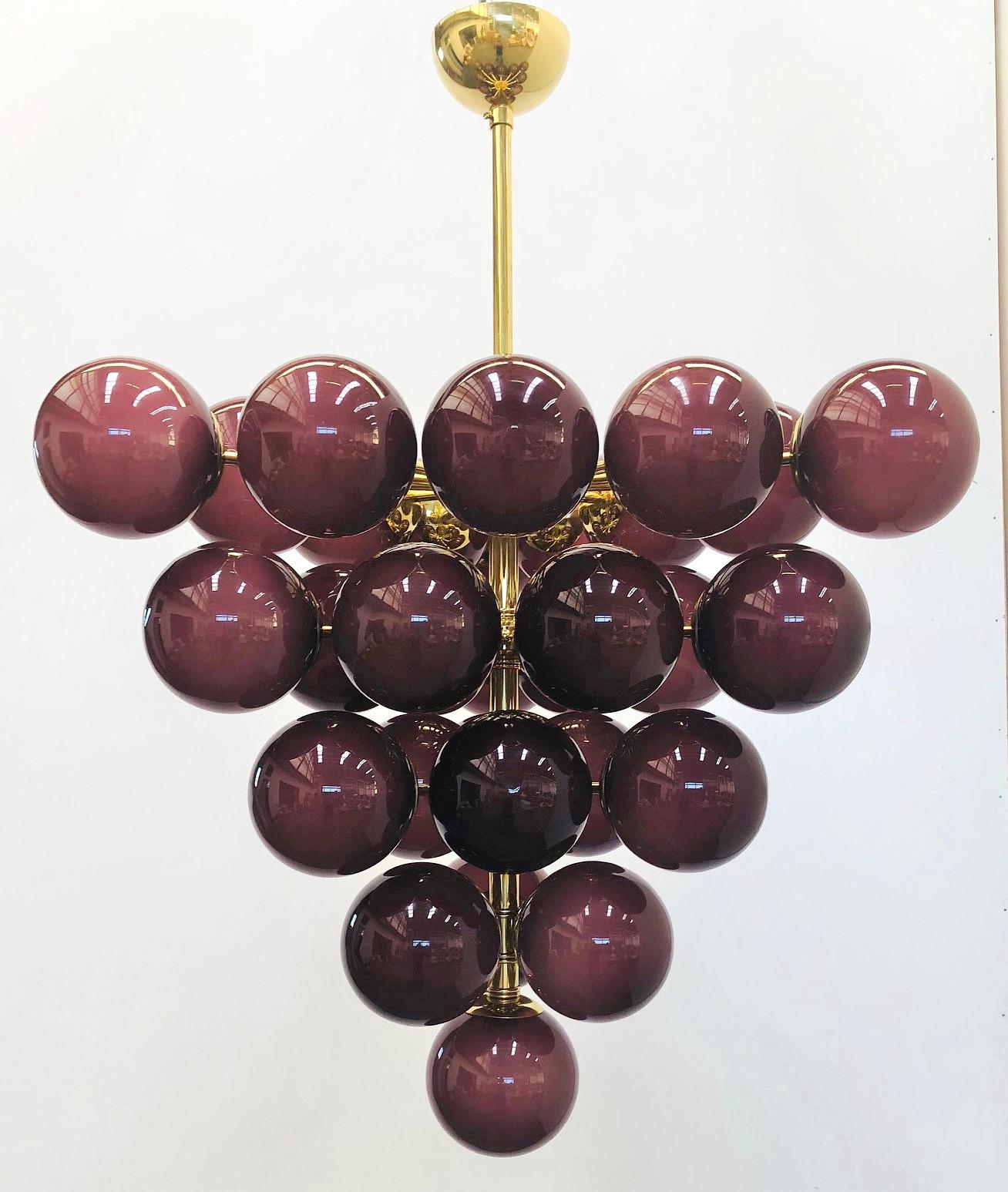 Italian chandelier with frosted amethyst Murano glass globes  mounted on polished brass frame / Designed by Fabio Bergomi for Fabio Ltd / Made in Italy
31 lights / E12 or E14 type / max 40W each
Diameter: 31.5 inches / Height: 31.5 inches not