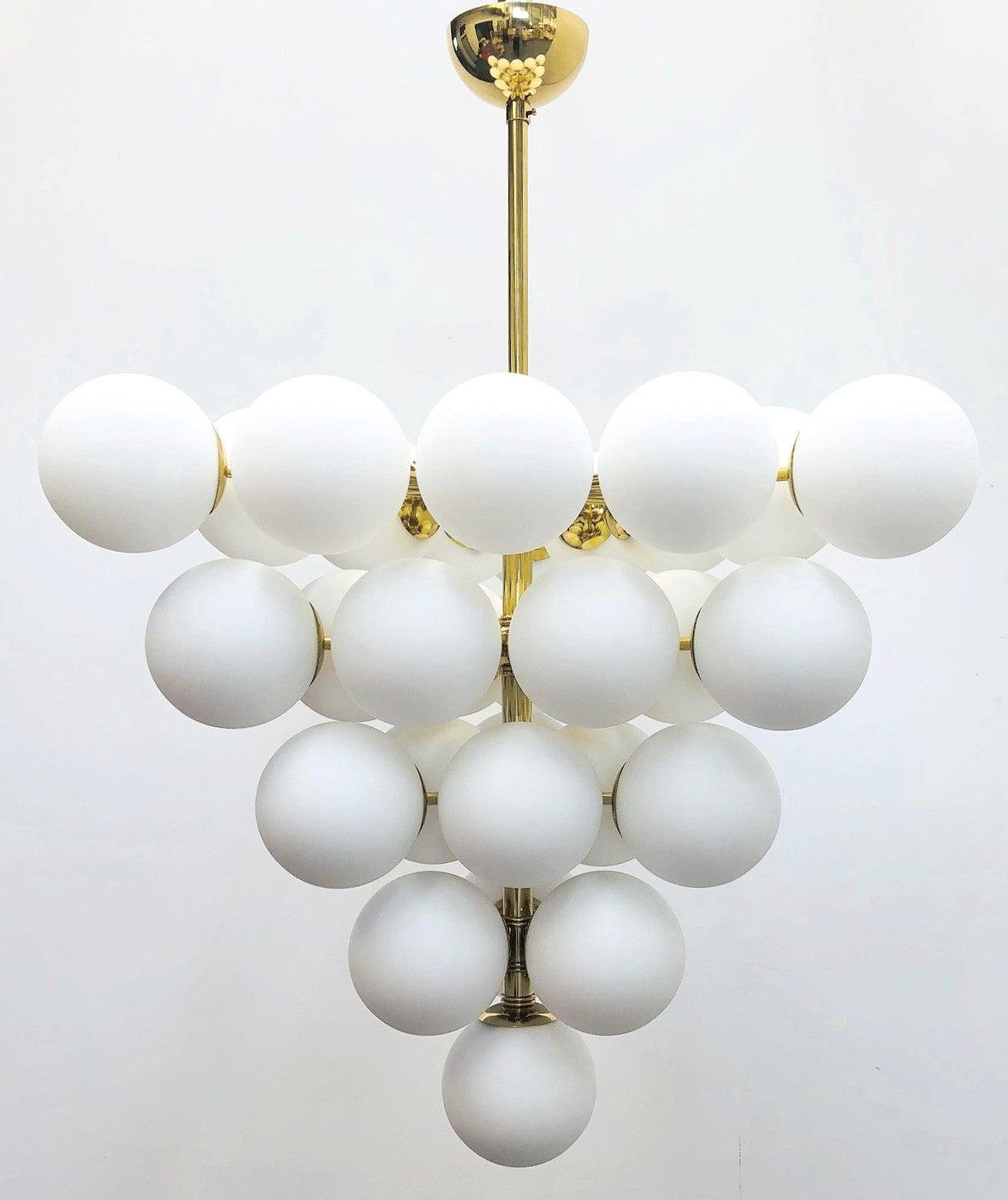 Italian chandelier with matte white Murano glass globes mounted on polished brass frame / designed by Fabio Bergomi for Fabio Ltd, made in Italy
31-light / E12 or E14 type / max 40W each
Measures: Diameter 31.5 inches, height 31.5 inches not